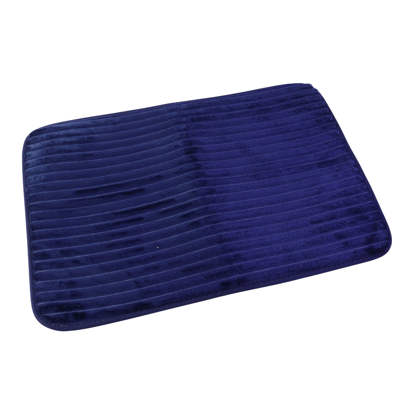 A rectangular navy blue ribbed memory foam bath mat is shown on a plain white background.