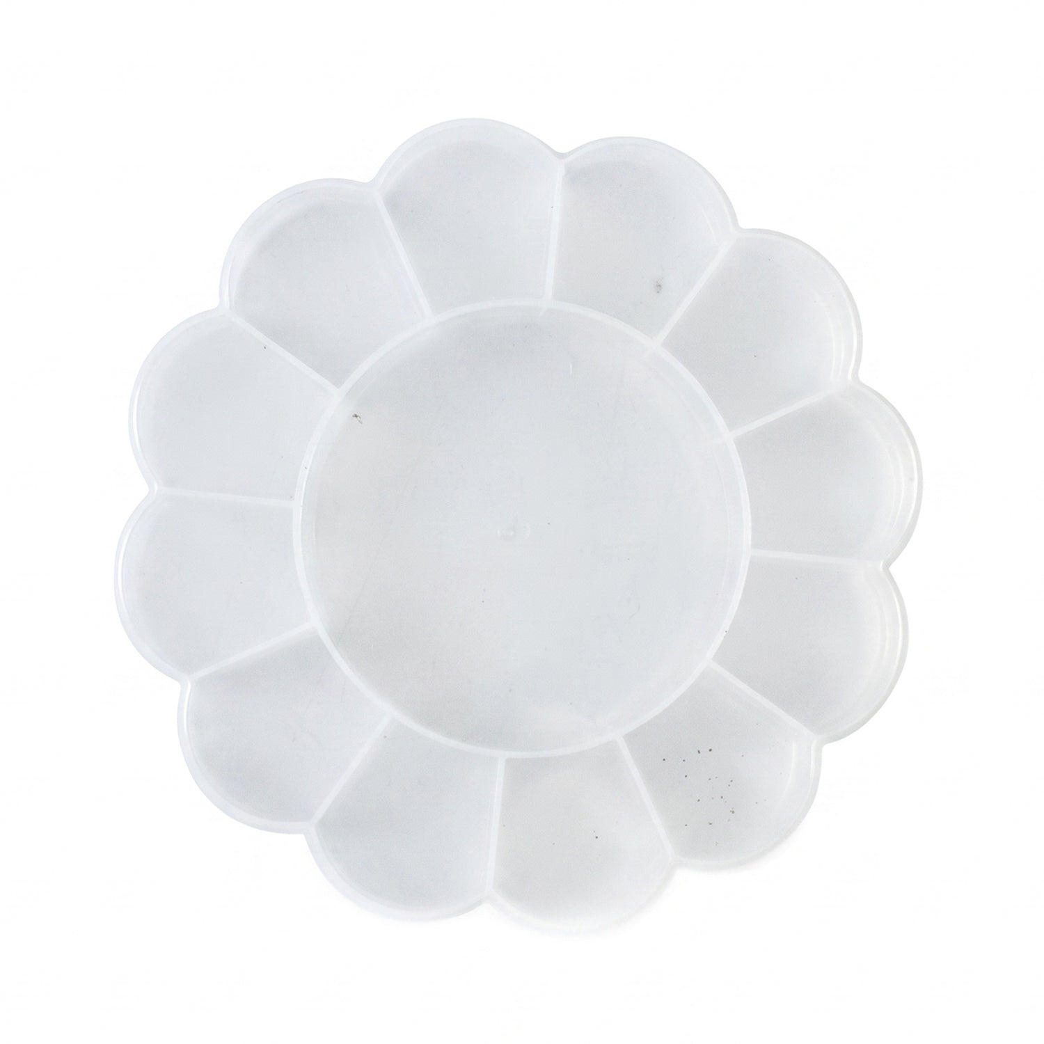 Top-down view of an empty, clear, flower-shaped plastic organizer box with 13 compartments on a white background.