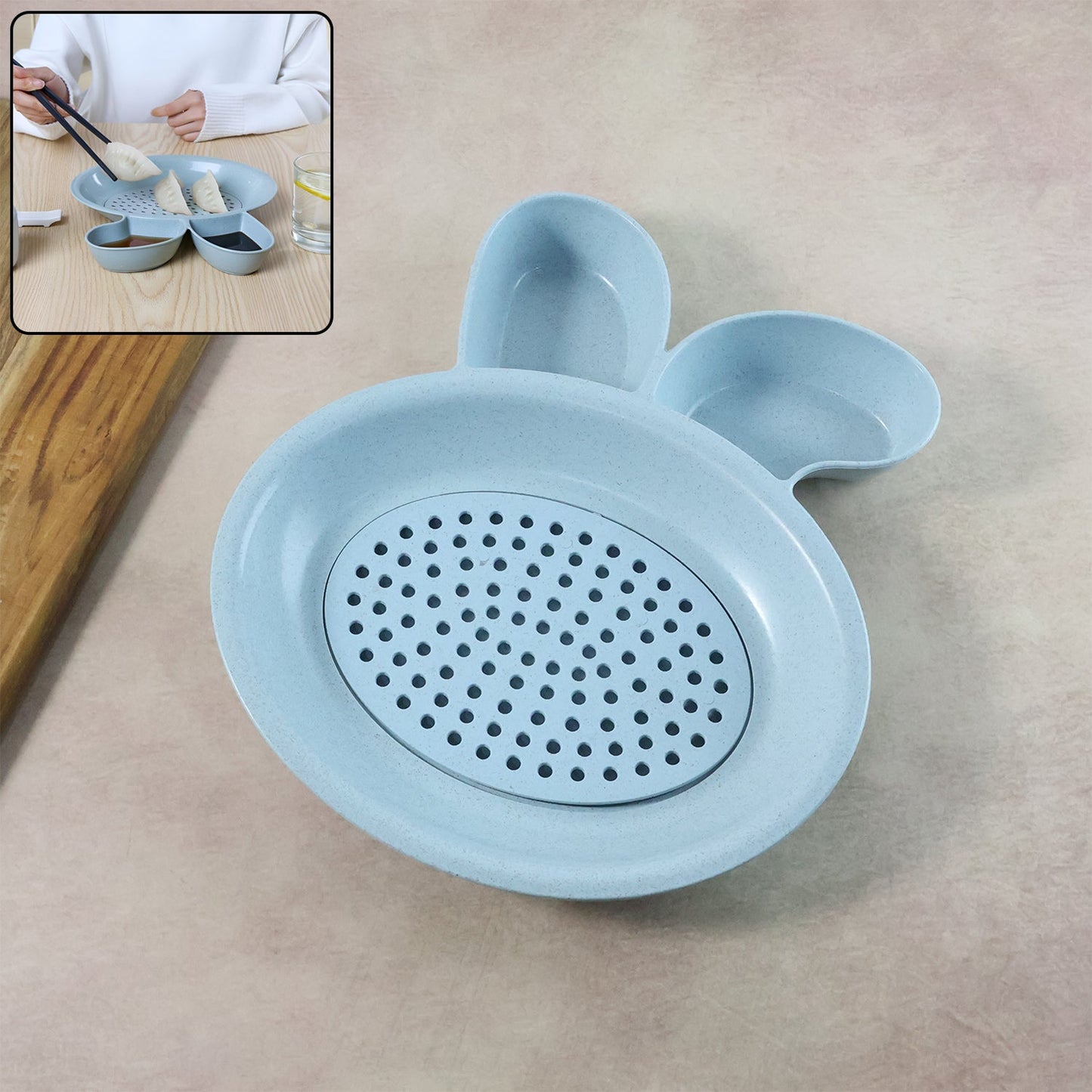 Dumpling serving plate with built-in perforated strainer for draining excess oil