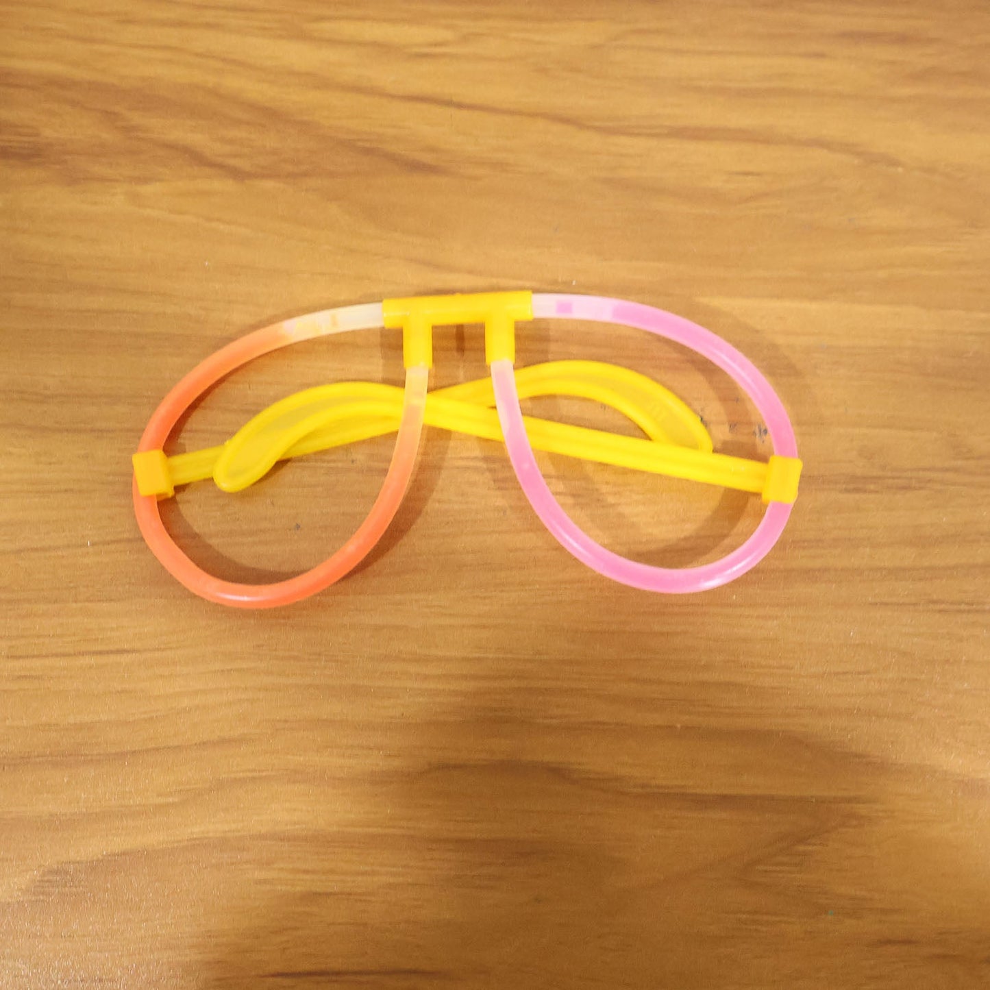 Live event with partygoers wearing glowing neon glasses