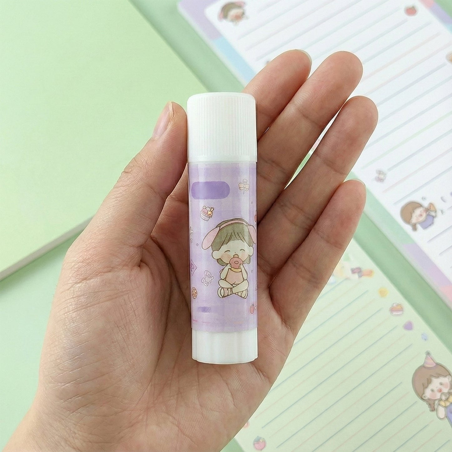 Twist-up mechanism of cartoon design solid glue stick for controlled use