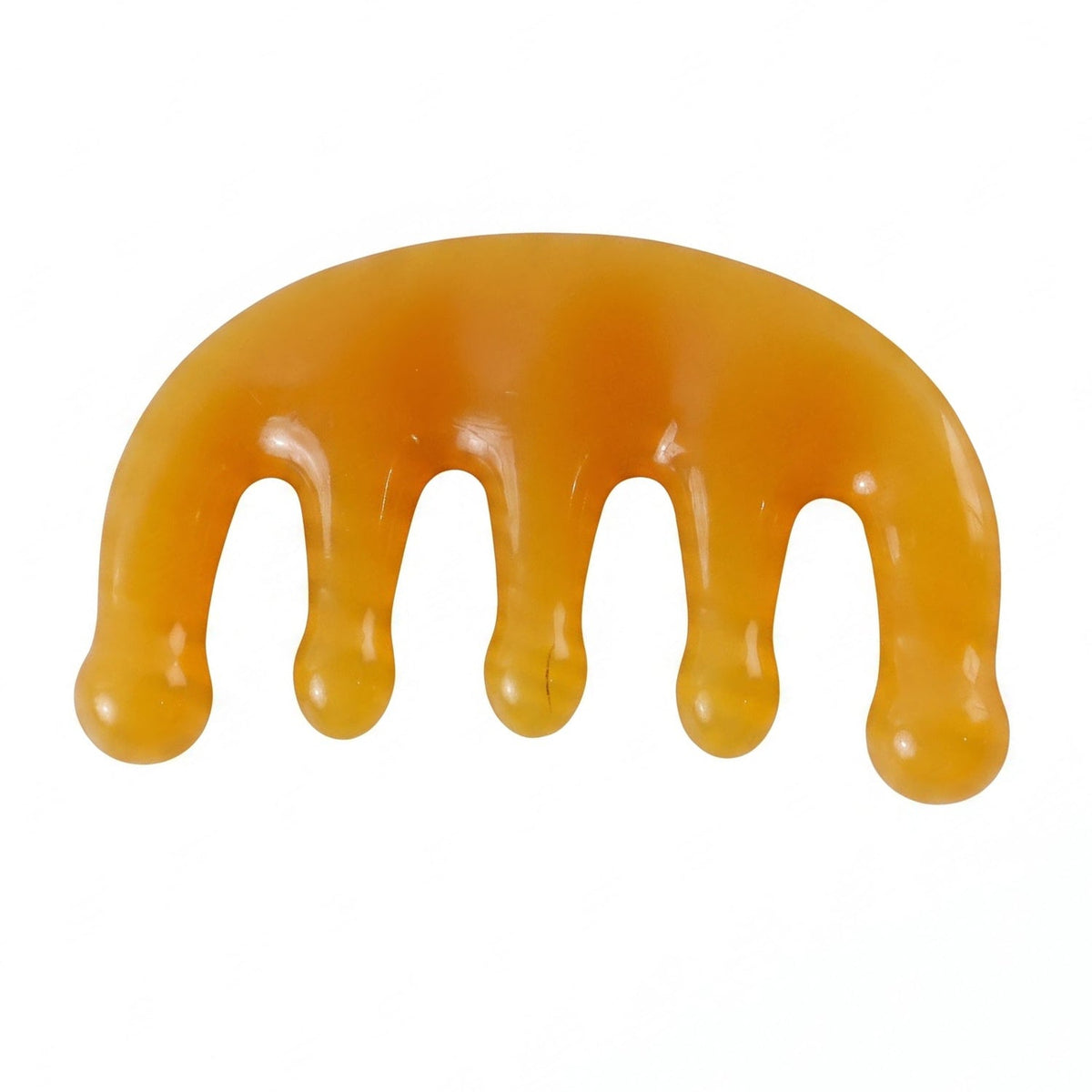 The orange scalp massager comb with five rounded prongs is isolated against a clean white background.