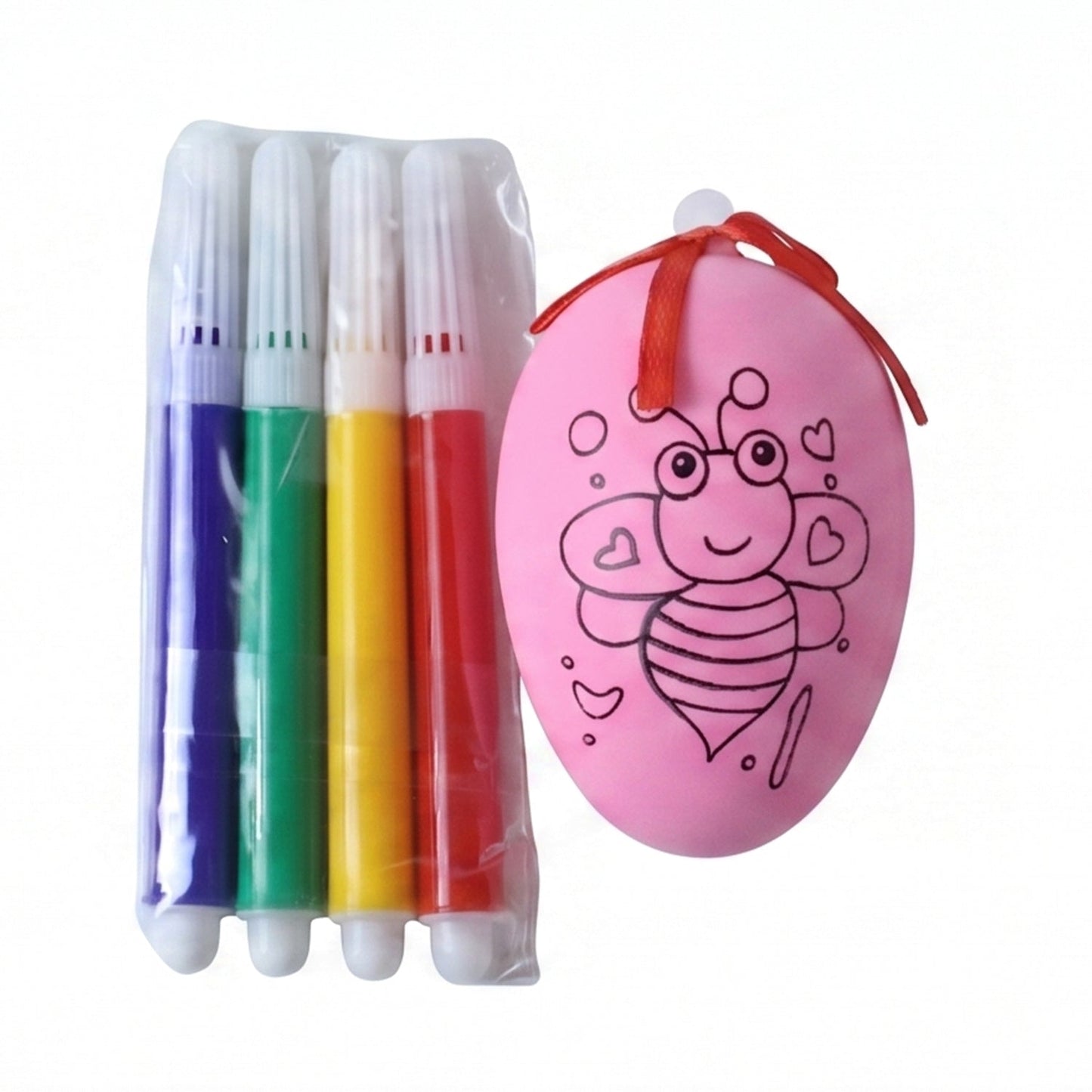 Children’s egg decorating activity with color pens