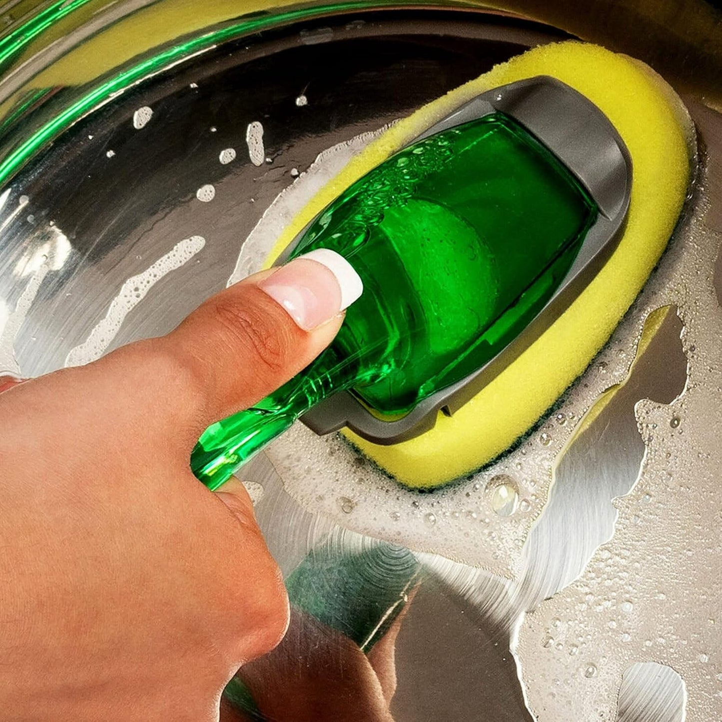 Durable dishwand with ergonomic handle and soap dispenser