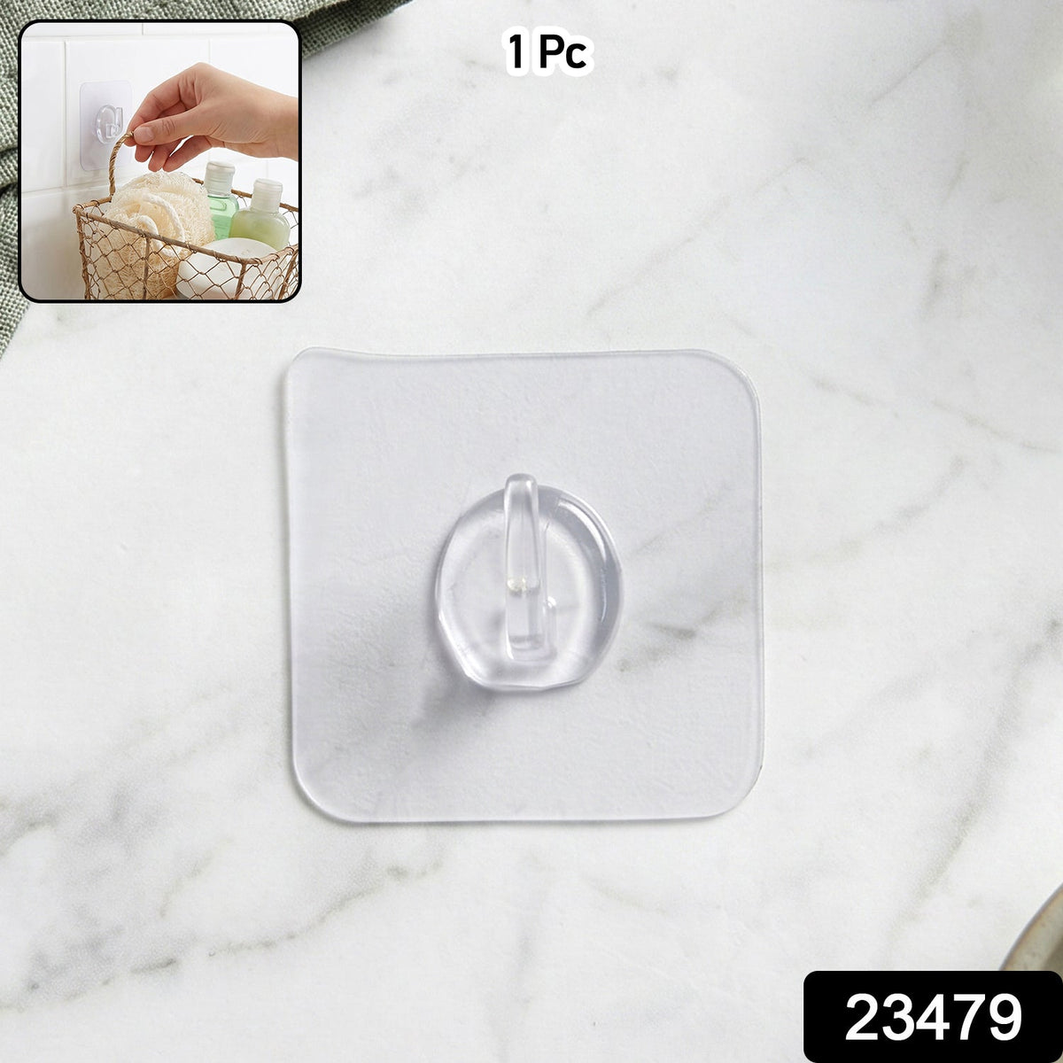 A single clear self-adhesive wall hook on a white marble surface, with a small inset image of it in use.