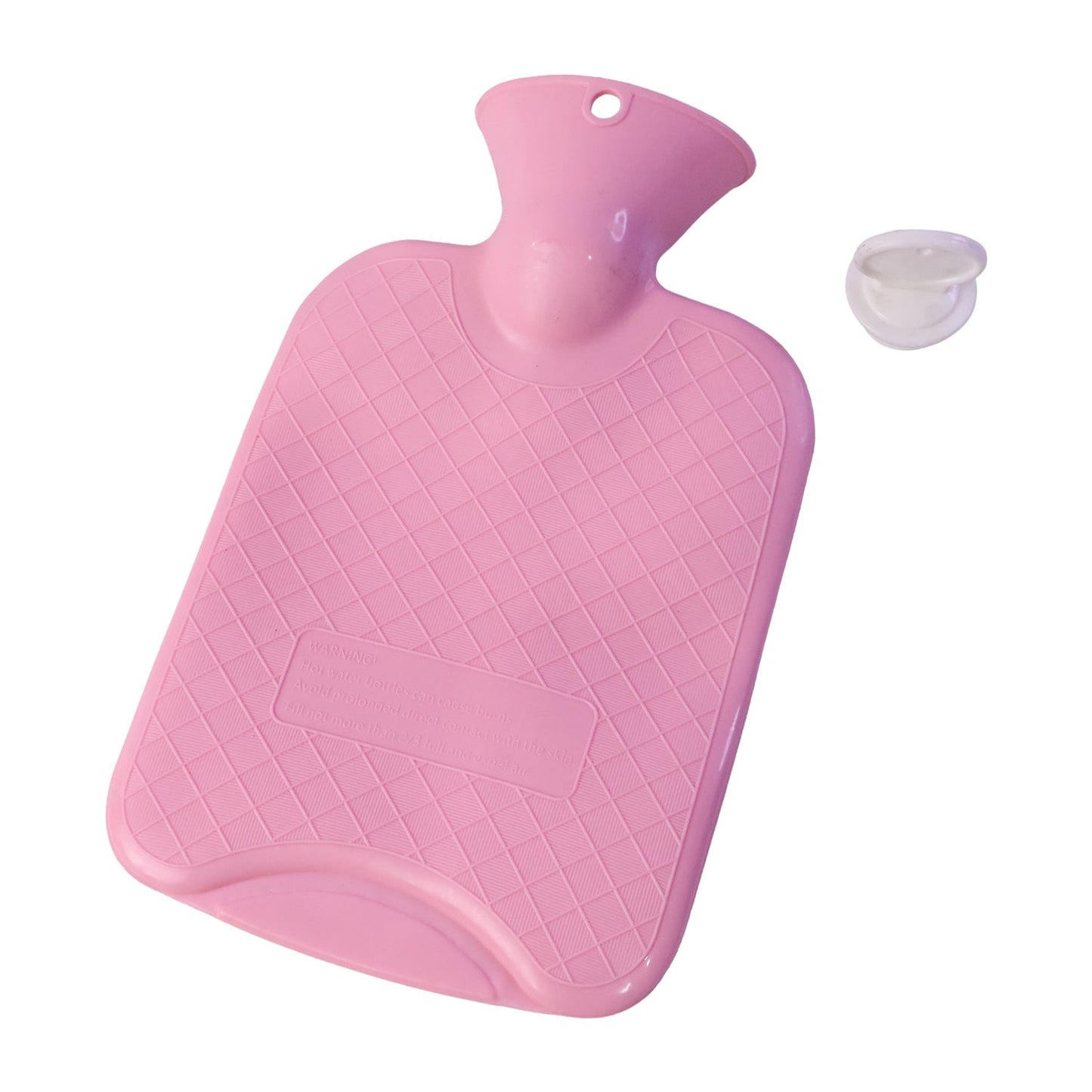 A pink hot water bag with a textured surface and its white screw-on cap placed beside it.