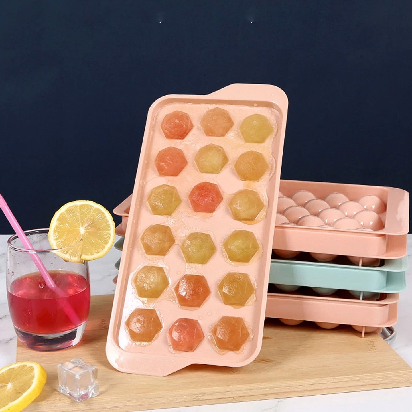 Empty plastic ice cube tray showing diamond-shaped molds