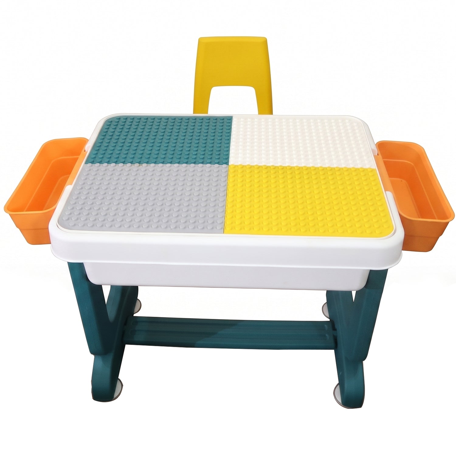 A teal and white activity table with a four-color building block surface and two orange storage bins, with a yellow chair