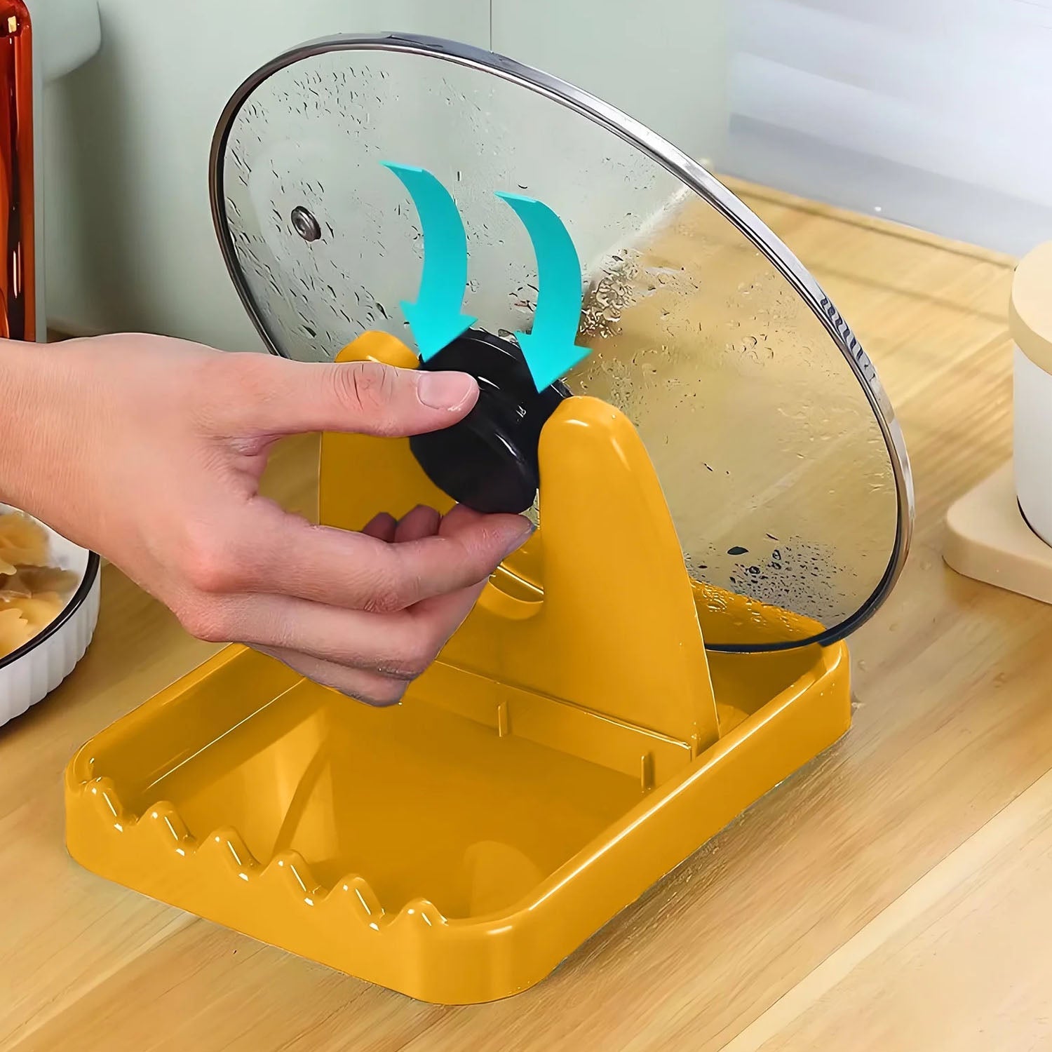 Close-up of kitchen lid and utensil holder stand showing compact design