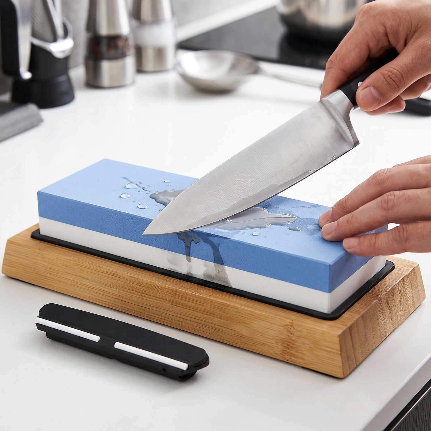 Sharpening a kitchen knife on the whetstone