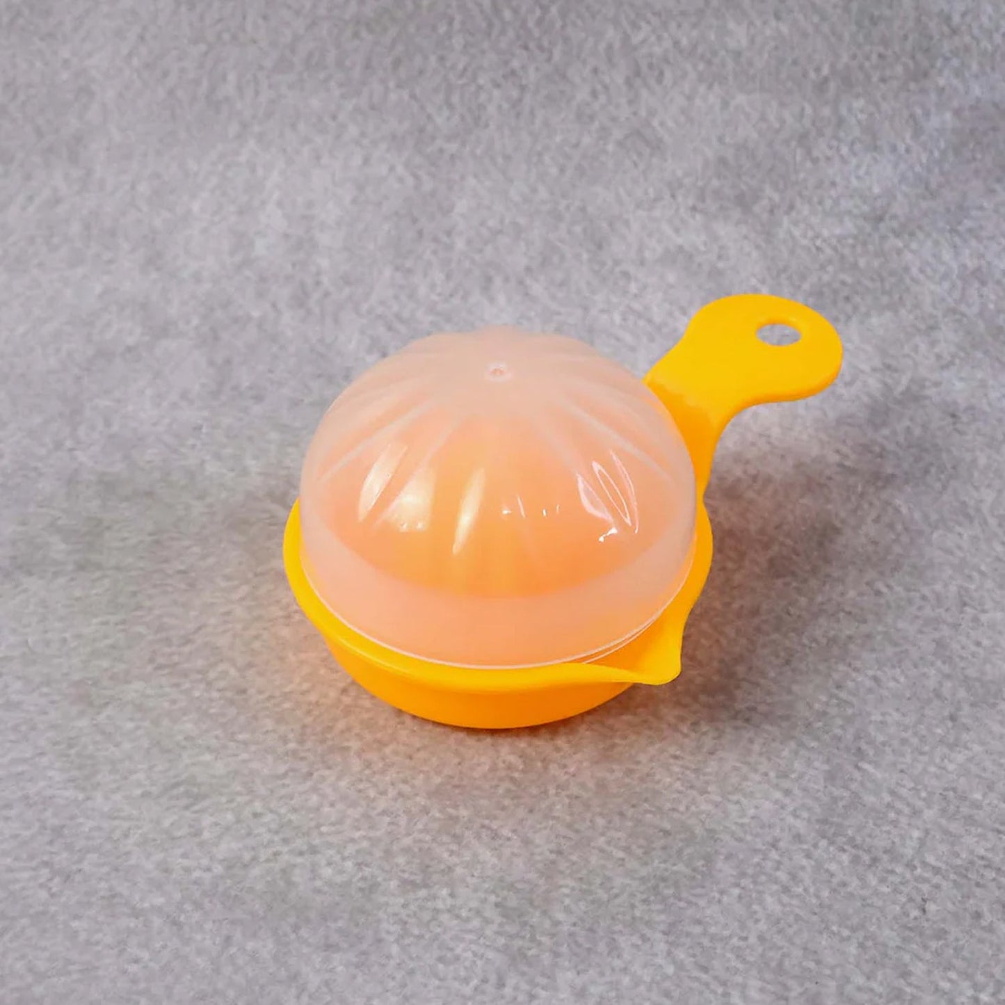 Yellow easy squeeze juicer for lemons and oranges