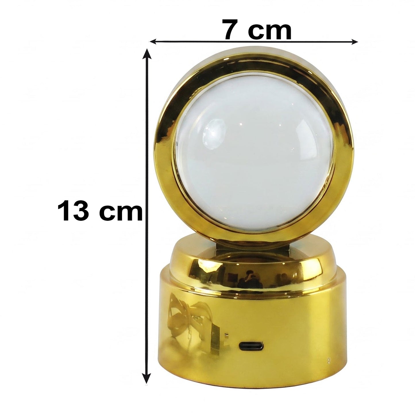 A golden 3D Crystal Ball LED Table Showpiece with a white opaque ball, a charging cable, and measurements of 7 cm by 13 cm.