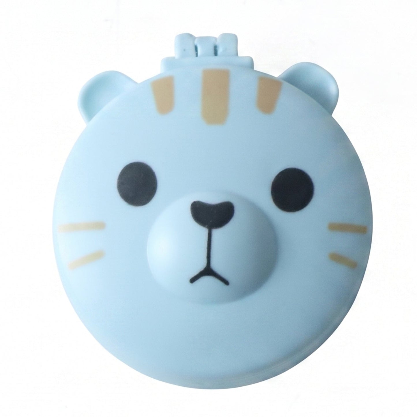 A light blue round folding hairbrush, closed, features a cartoon bear face with black eyes and nose, and tan stripes.