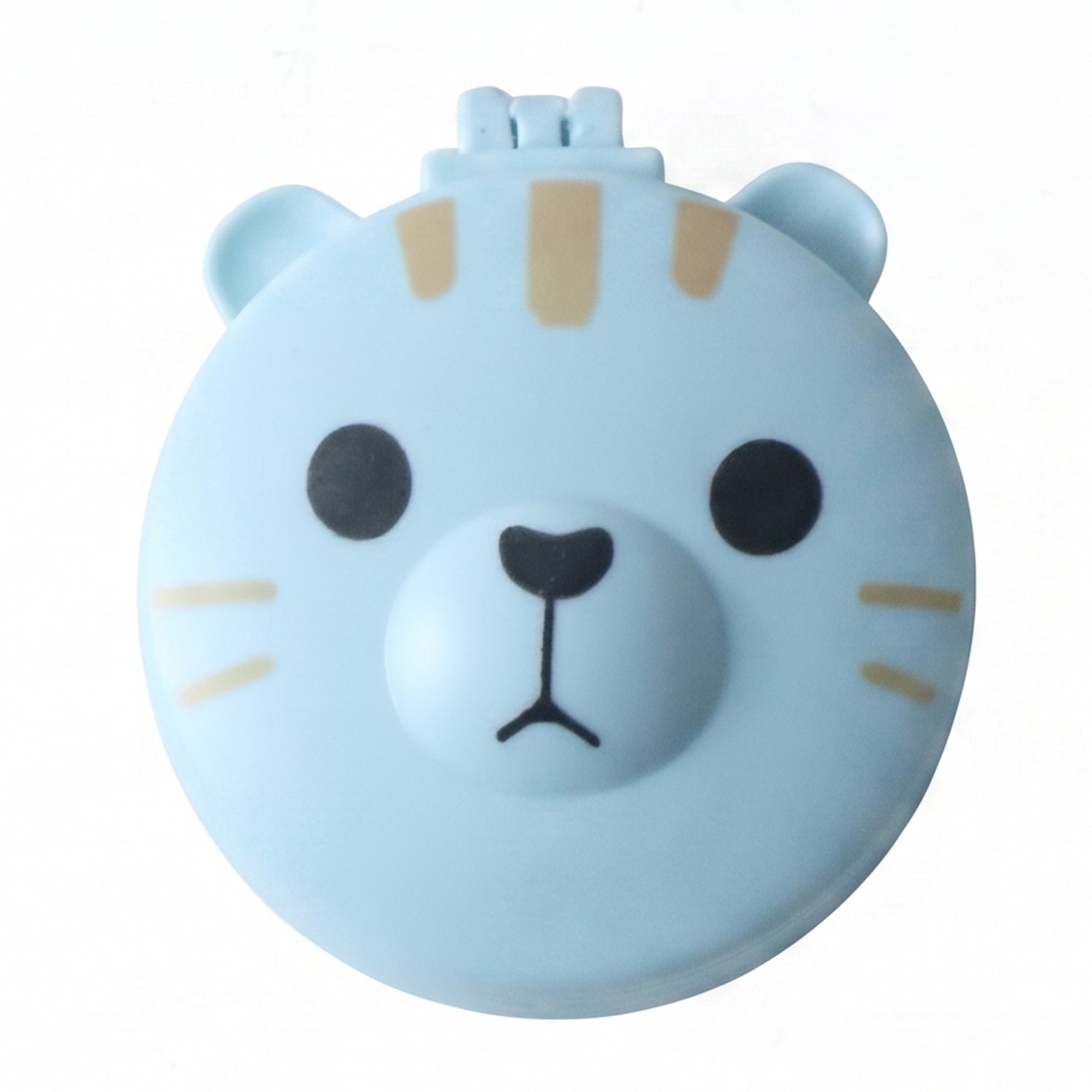 A light blue round folding hairbrush, closed, features a cartoon bear face with black eyes and nose, and tan stripes.