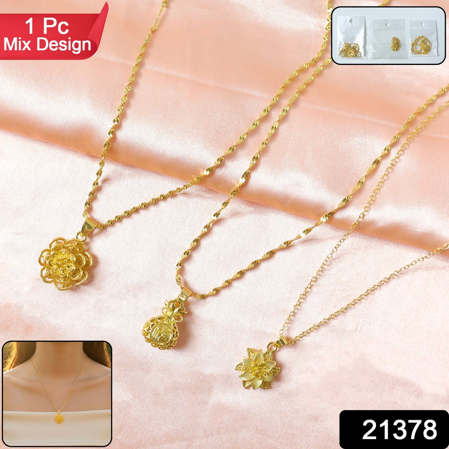 Close-up of floral design gold tone pendant jewelry