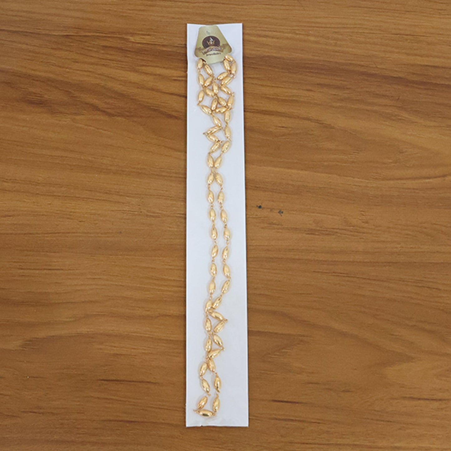 Gold tone oval bead necklace chain designed for elegant fashion