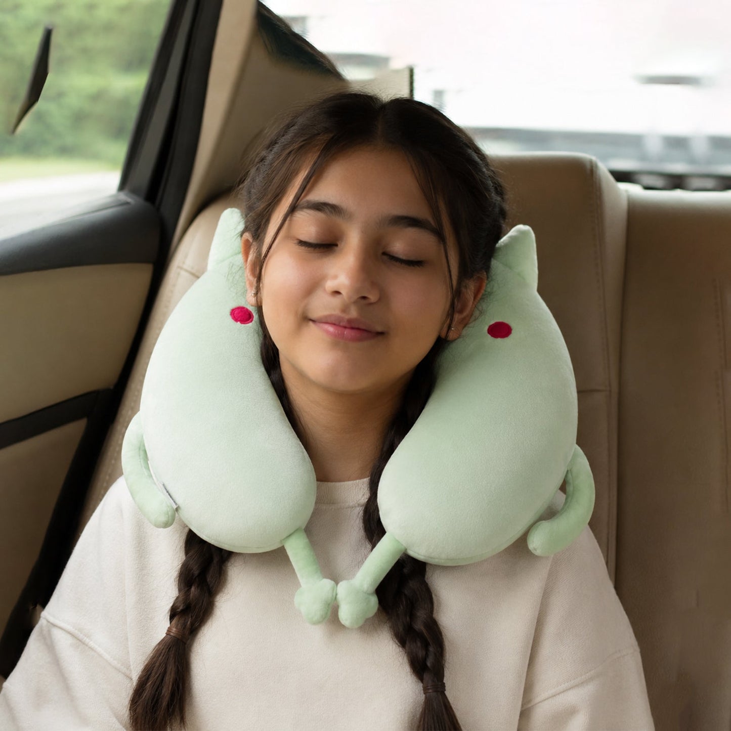 U shaped neck pillow worn while travelling