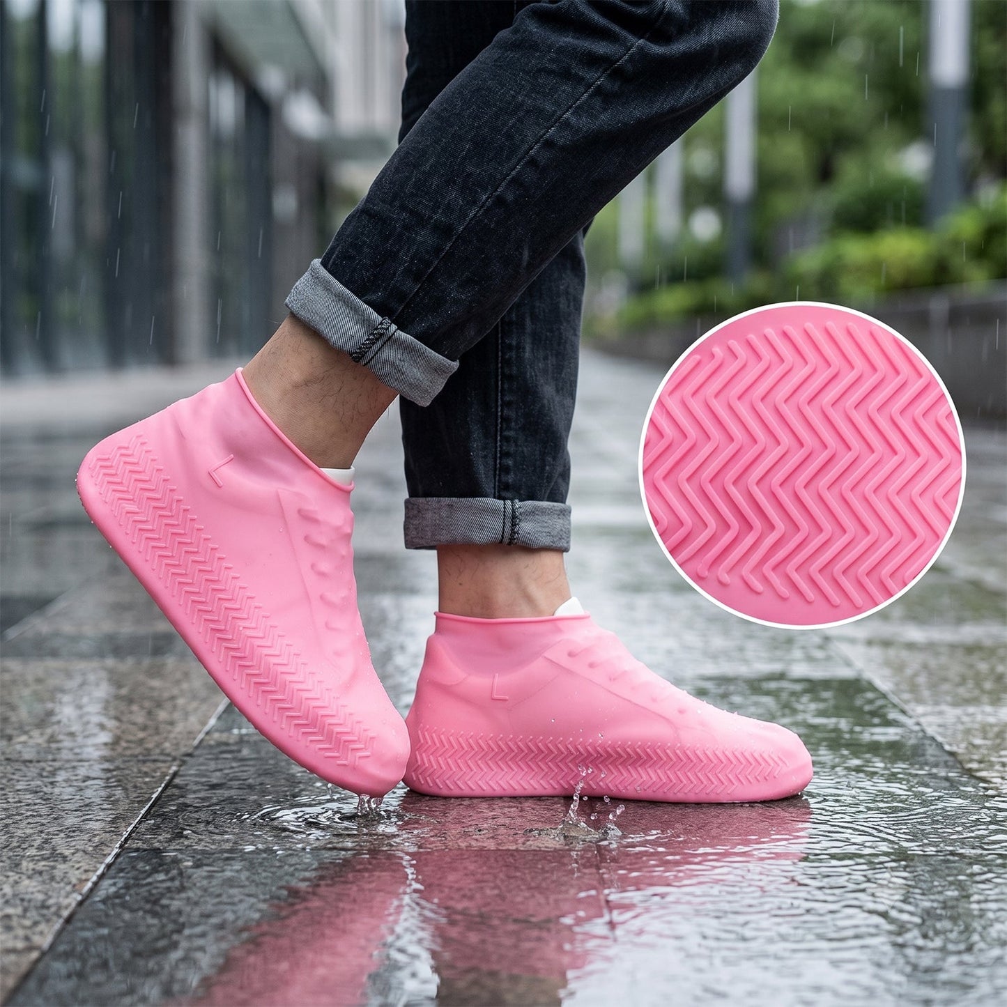 A person wears pink silicone shoe covers on a wet sidewalk; a circular inset shows a close-up of the zigzag tread pattern on