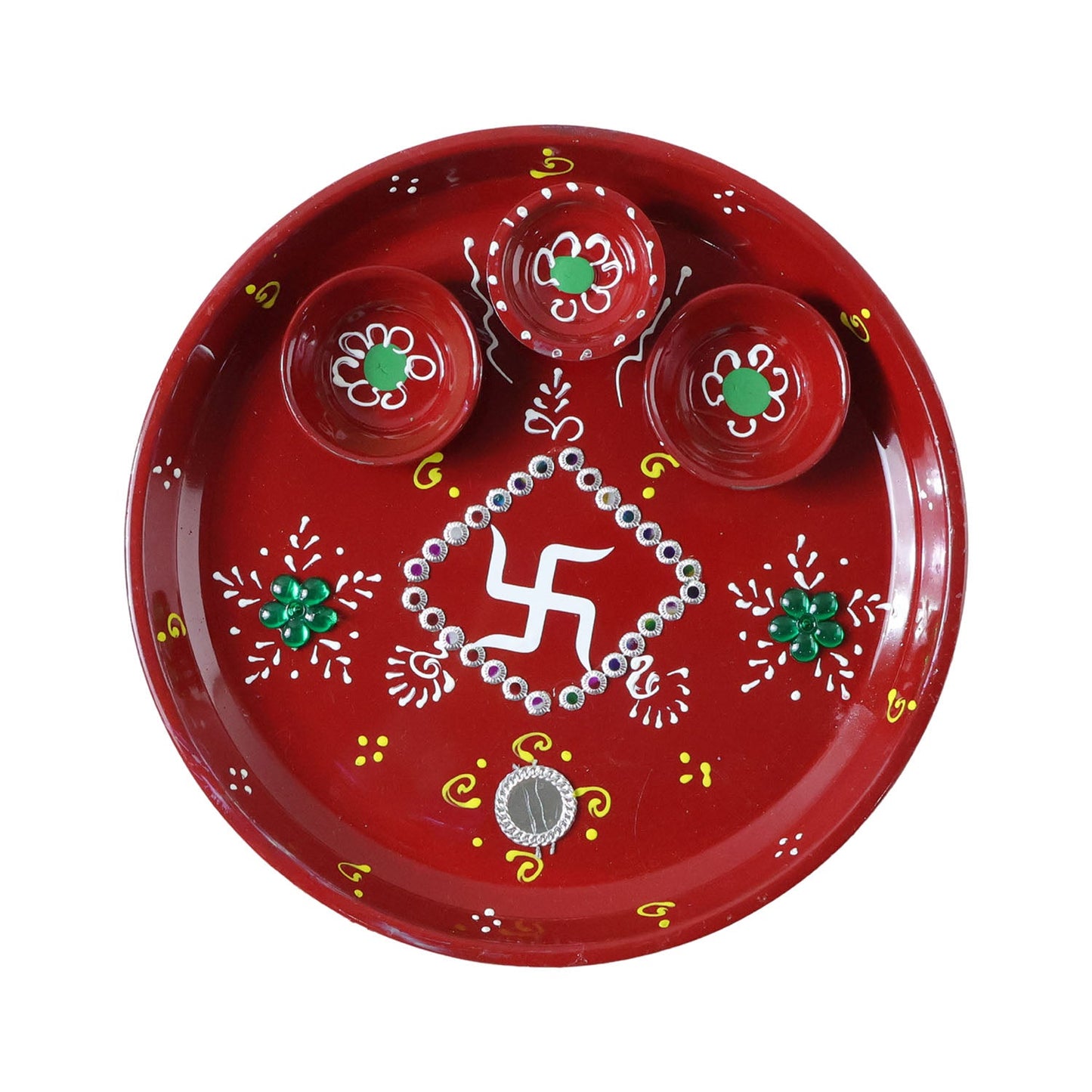 Three diyas arranged on vibrant hand-painted pooja thali for festivals