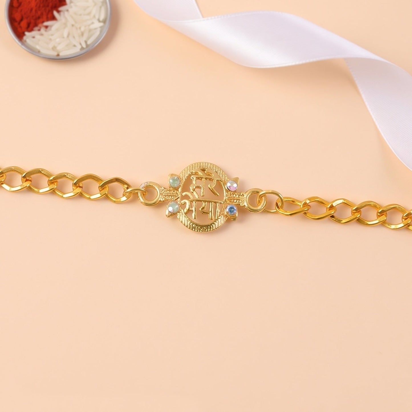 Mere Bhaiya bracelet rakhi with gold-plated chain and sparkling stones, ready for Raksha Bandhan.