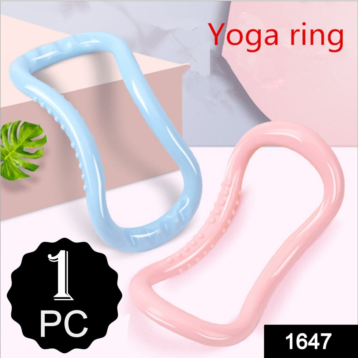 One light blue and one pink pilates ring with textured bumps on a light background.