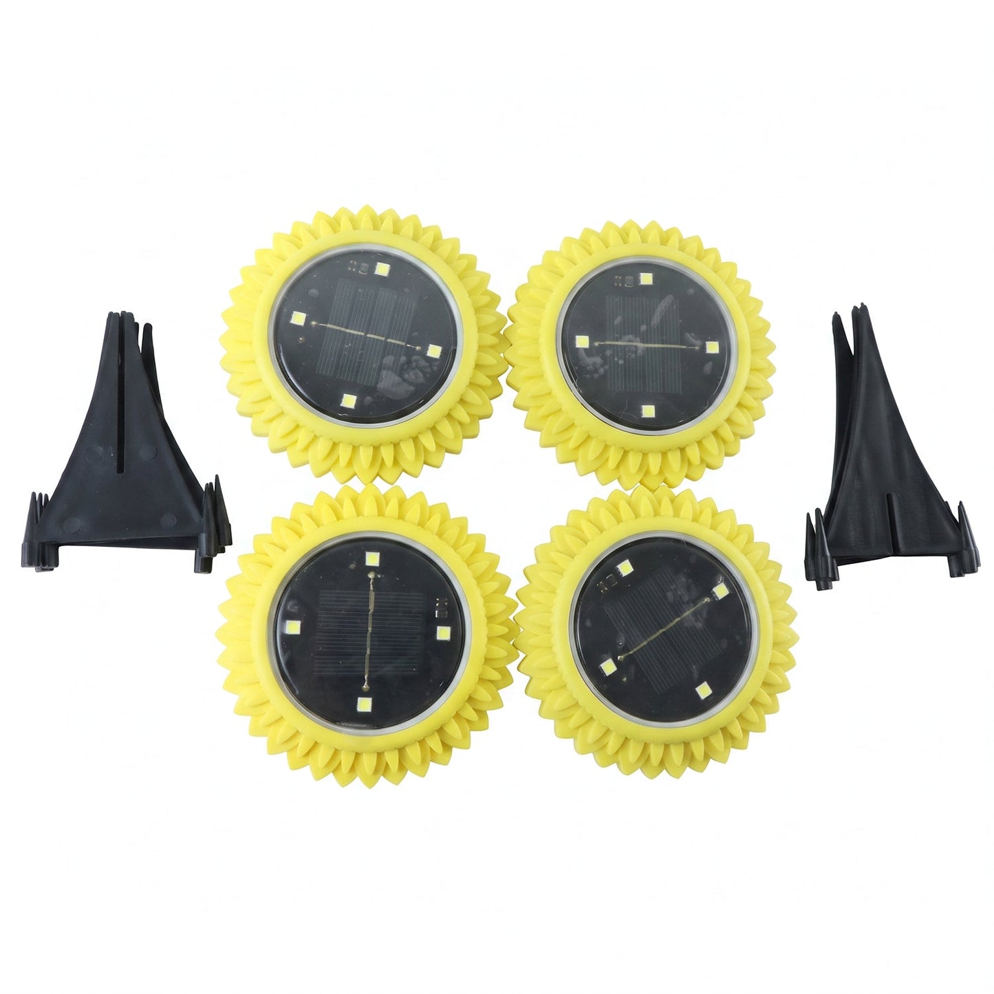 Four yellow, sunflower-shaped solar lights with black solar panels and two black ground stakes are displayed on a white