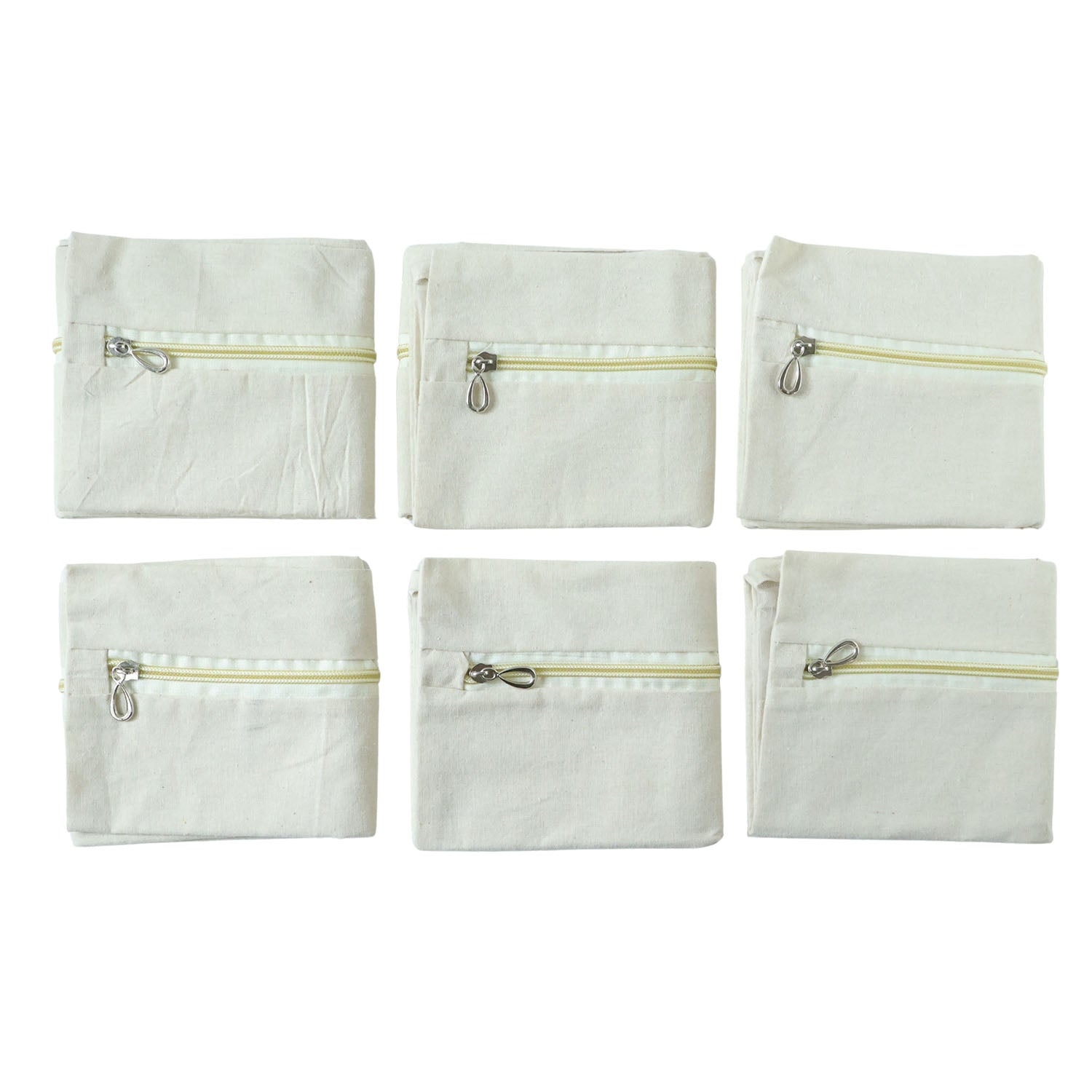 Six saree storage zipper pouches arranged for wardrobe organization