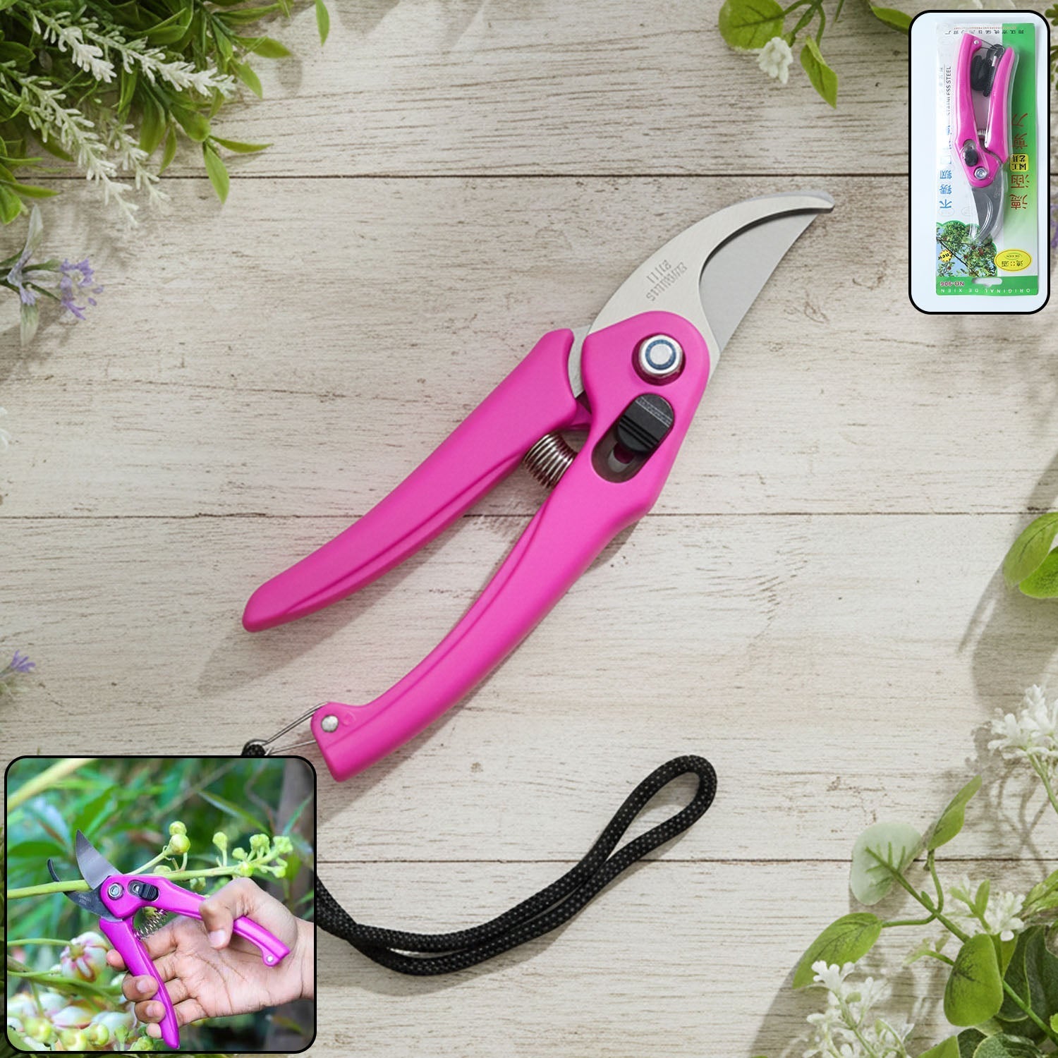 A pink garden pruner with a black wrist strap on a wooden surface, surrounded by greenery and flowers.