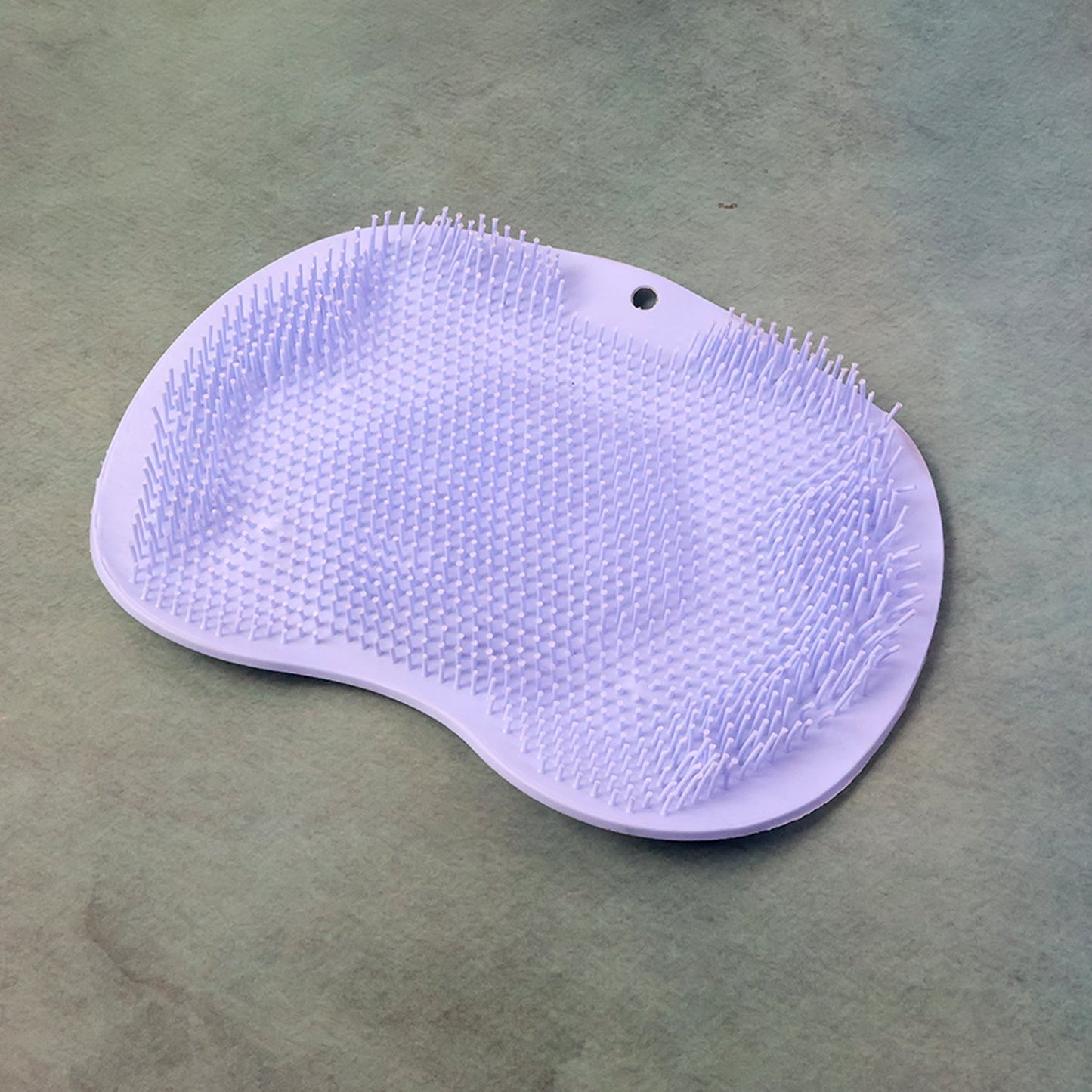 Silicone scrubber bath mat featuring anti-slip suction cups for stability