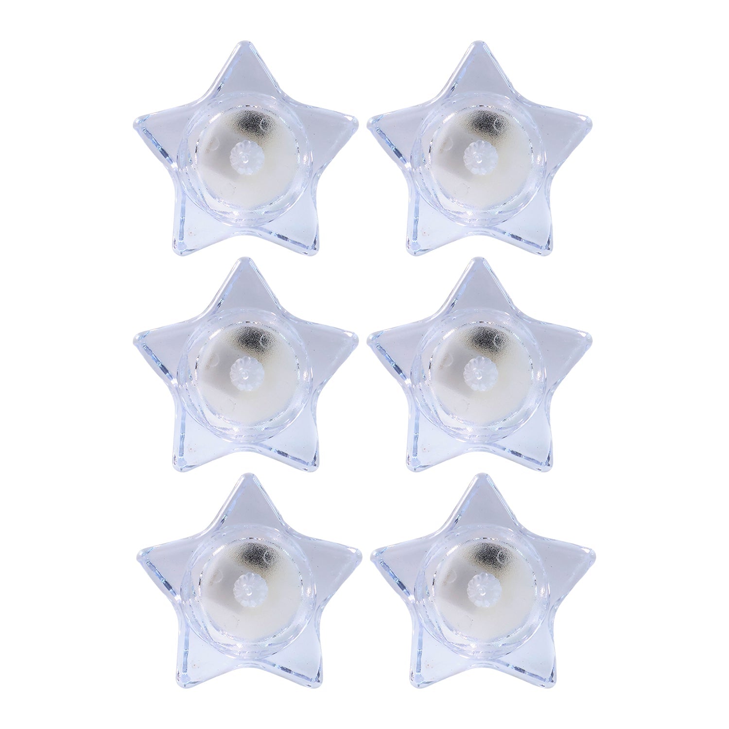 Battery operated LED candles in star-shaped holders for safe lighting