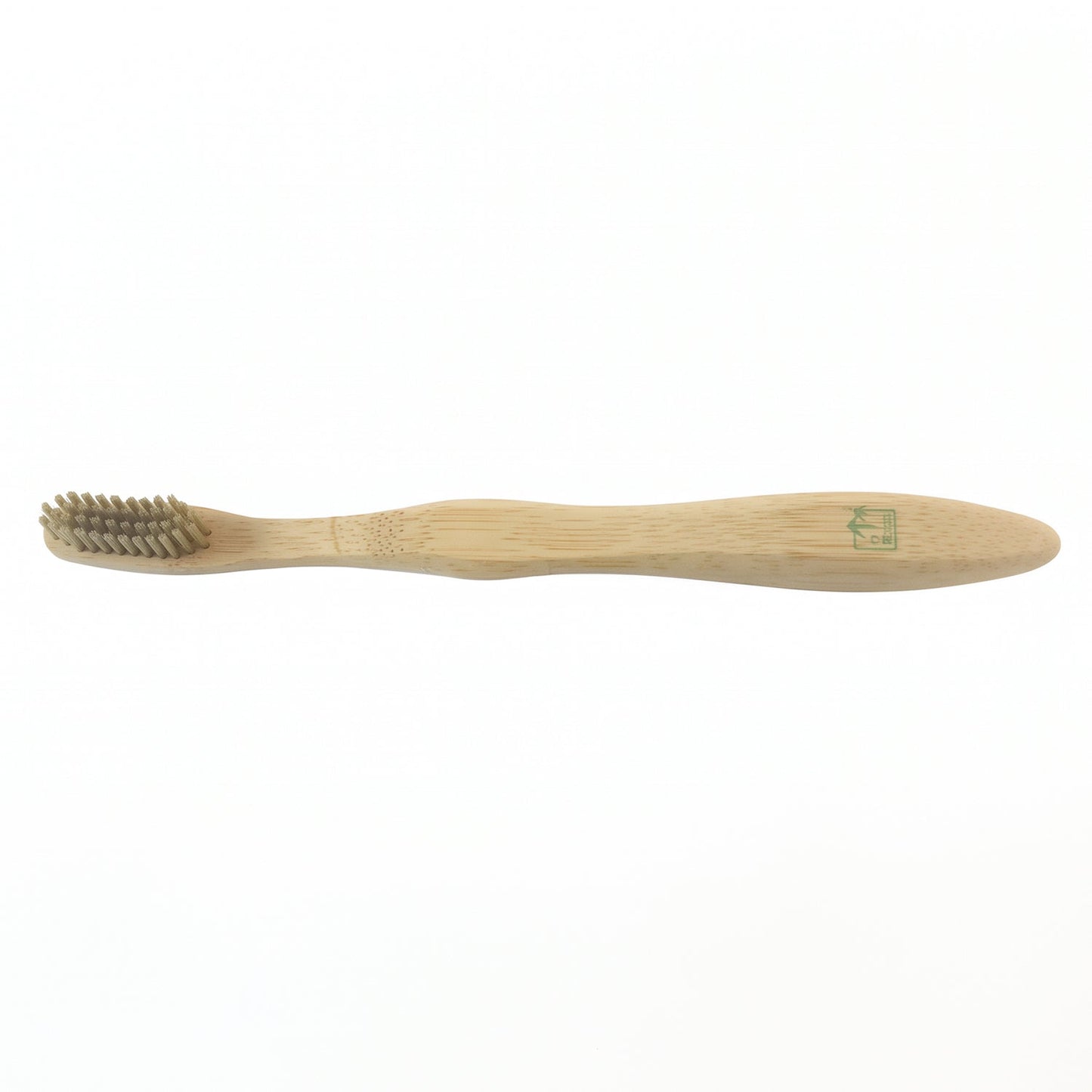 A light brown bamboo toothbrush with gray bristles is centered on a plain white background.