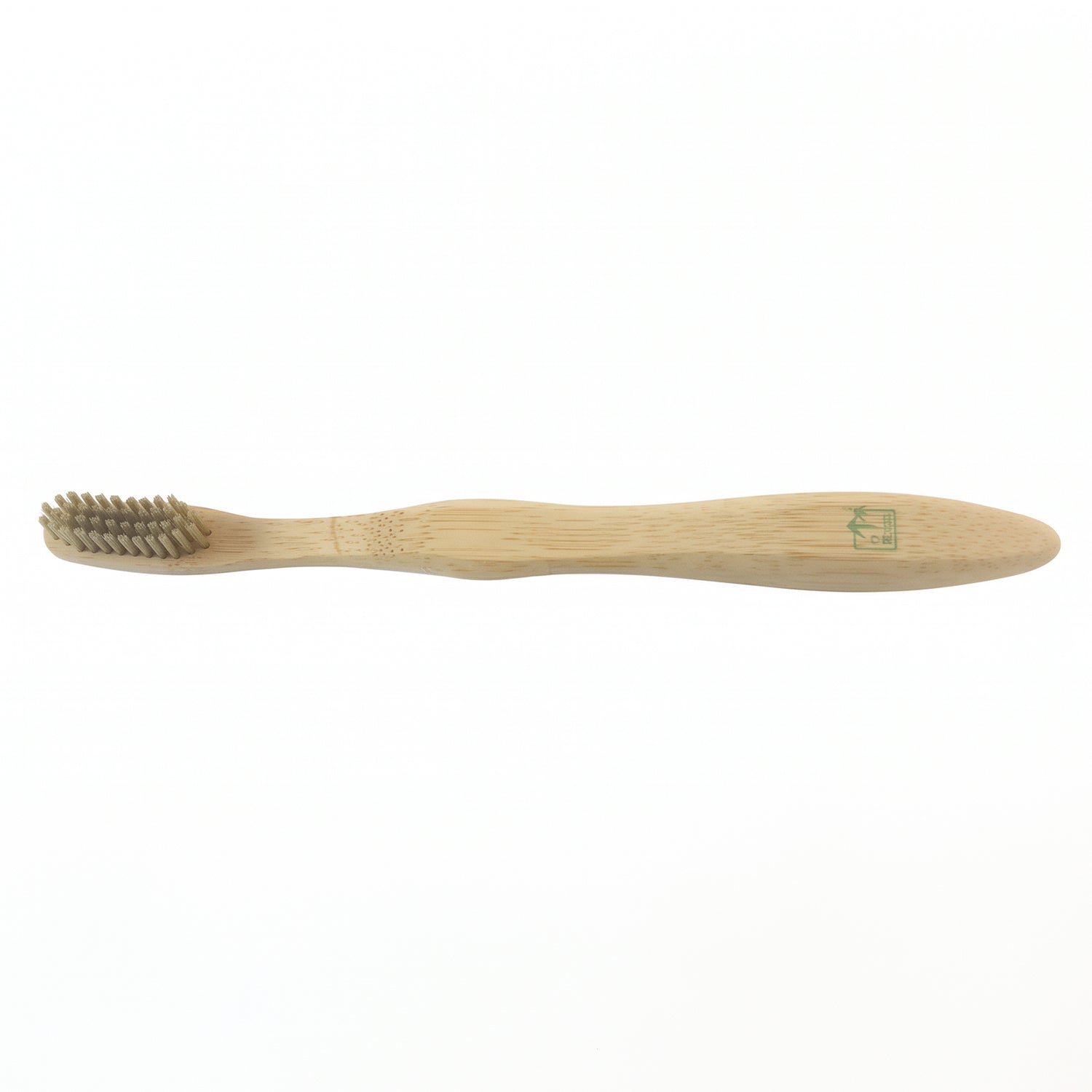 A light brown bamboo toothbrush with gray bristles is centered on a plain white background.