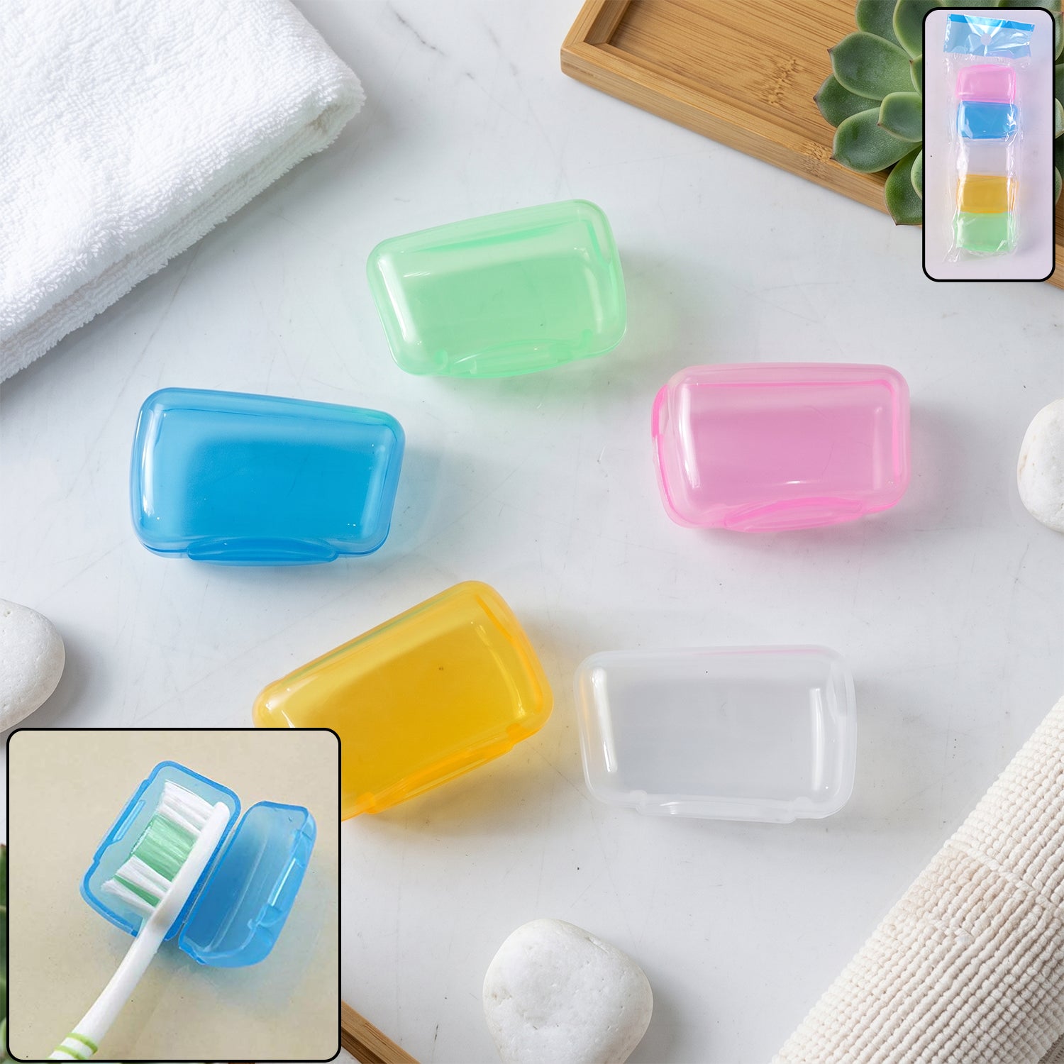Five translucent plastic toothbrush head covers in blue, green, pink, yellow, and clear are scattered on a white marble