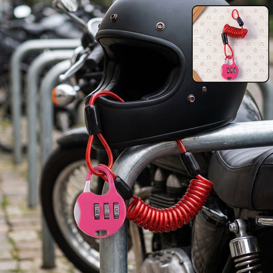 A black motorcycle helmet is secured to a bike rack with a pink combination lock and red coiled cable.