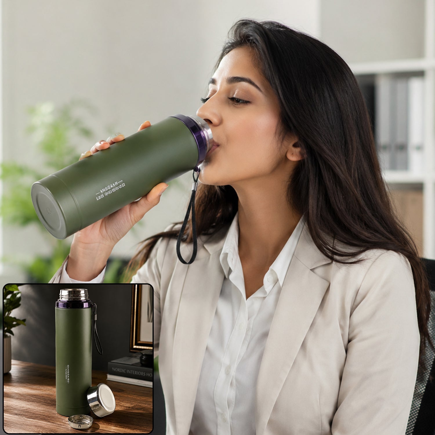 A woman in a beige blazer drinks from a matte green water bottle with a purple rim and black strap.