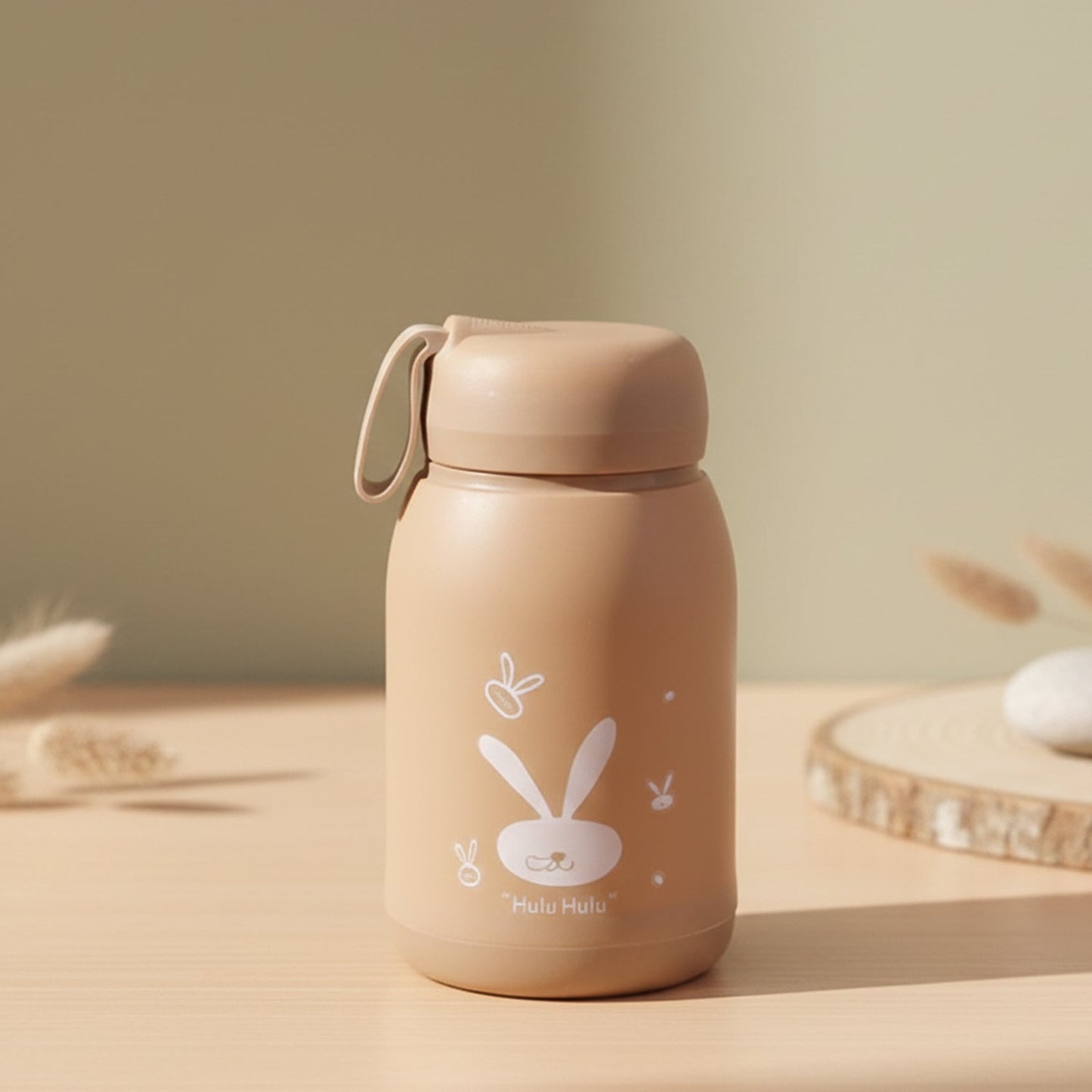 Glass water bottle featuring cute bunny design for daily hydration