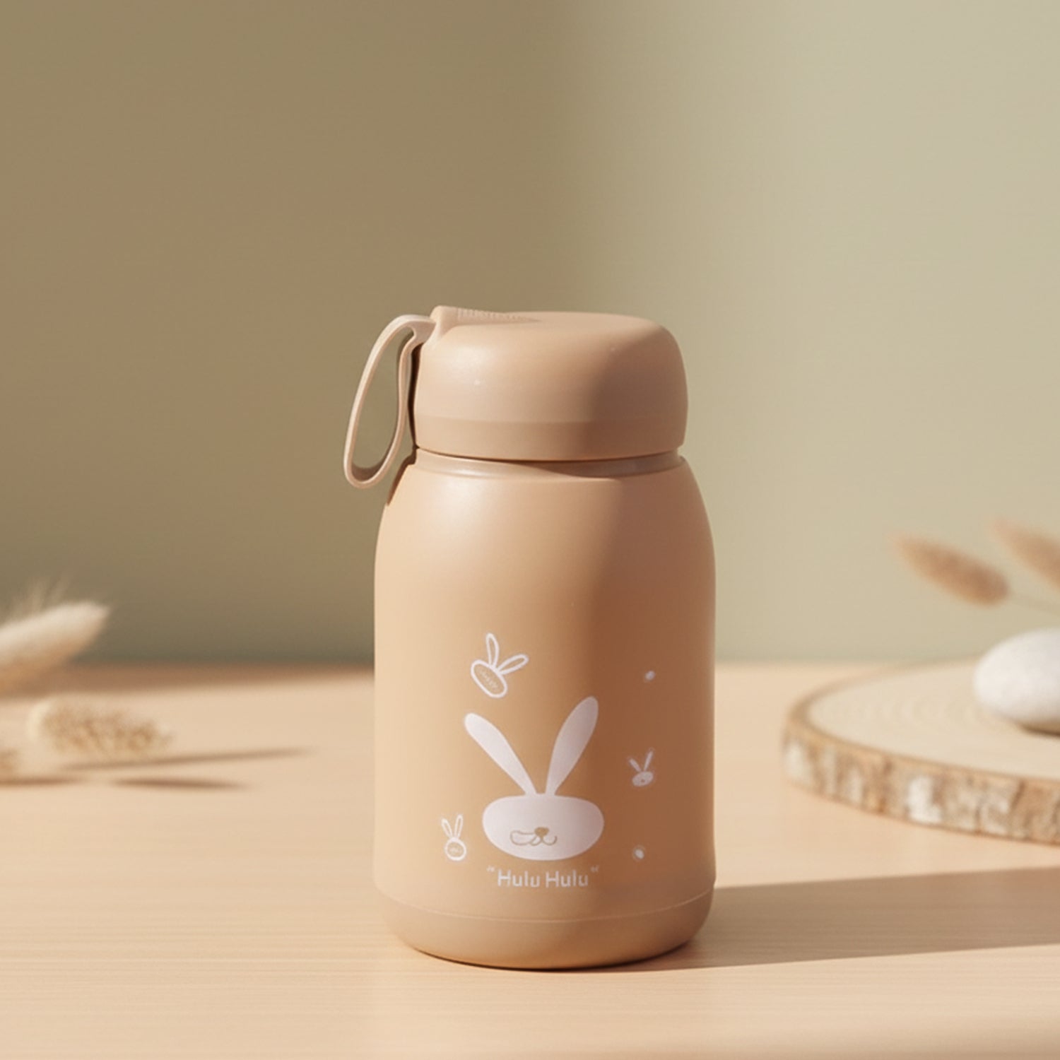 Glass water bottle featuring cute bunny design for daily hydration