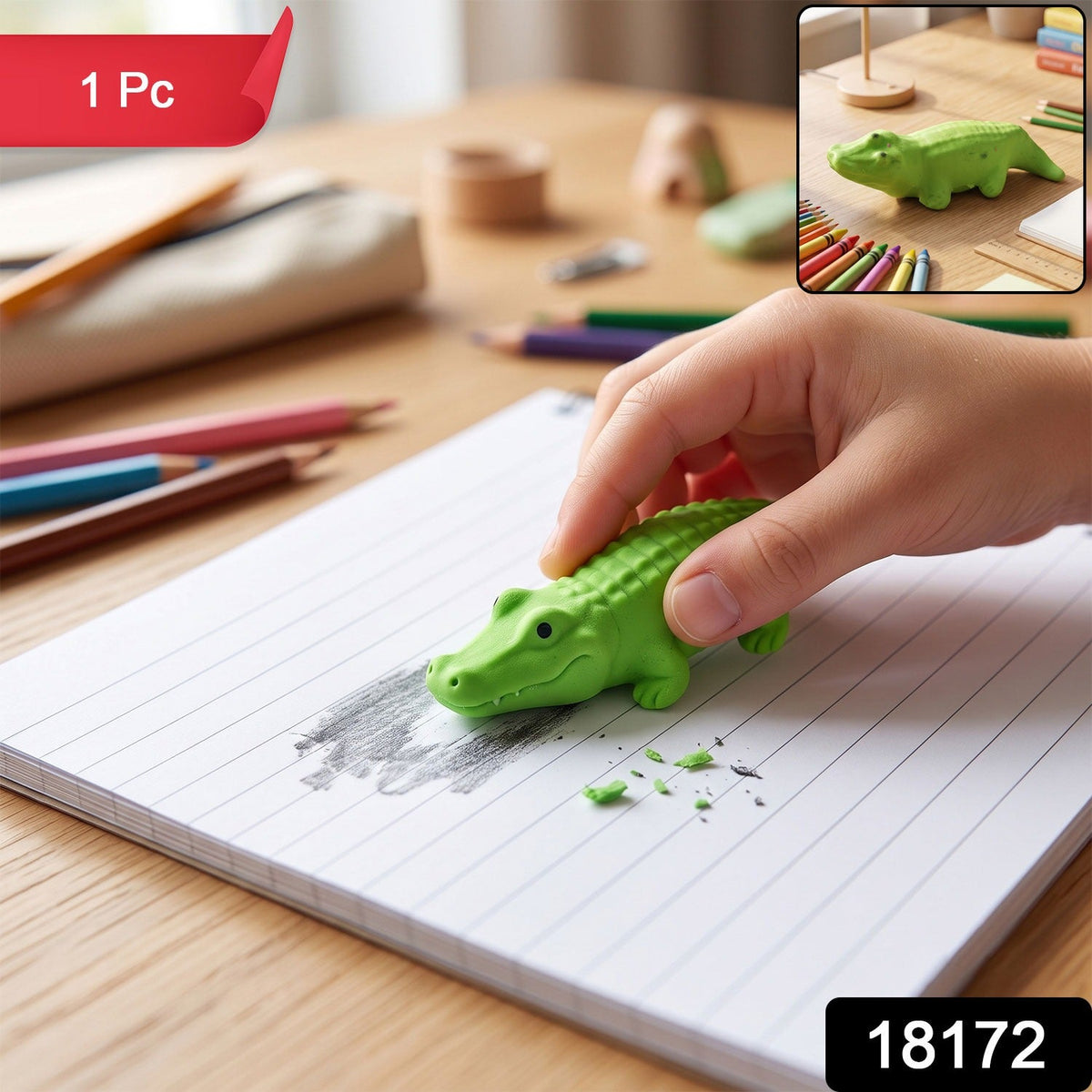 Green crocodile eraser for kids with colored pencils and lined notebook