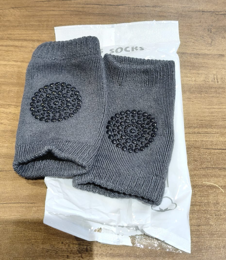 Side view of toddler knee guard wool knit leg warmers in dark grey