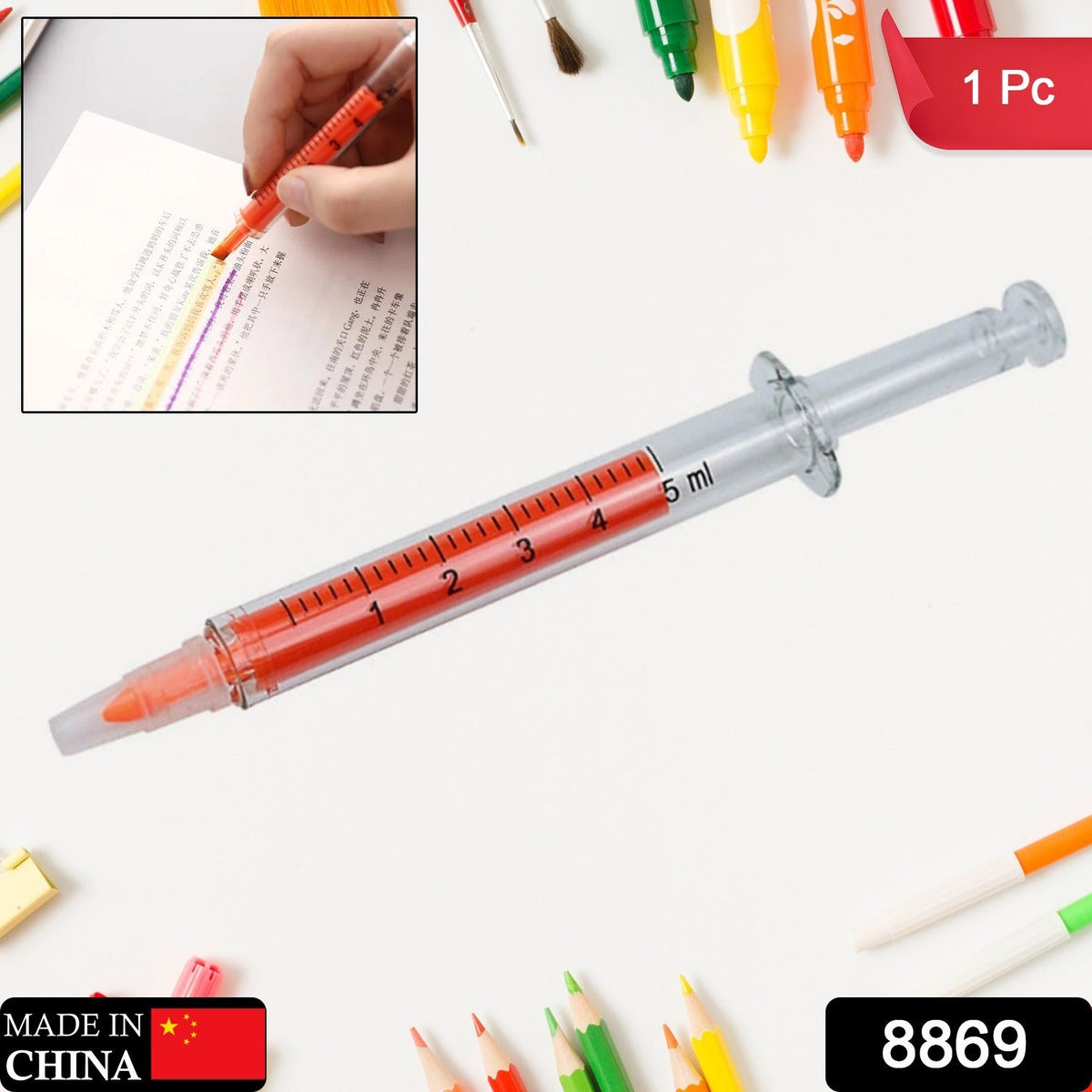 A single orange syringe highlighter with a clear barrel and measurements on a white background with other pens.