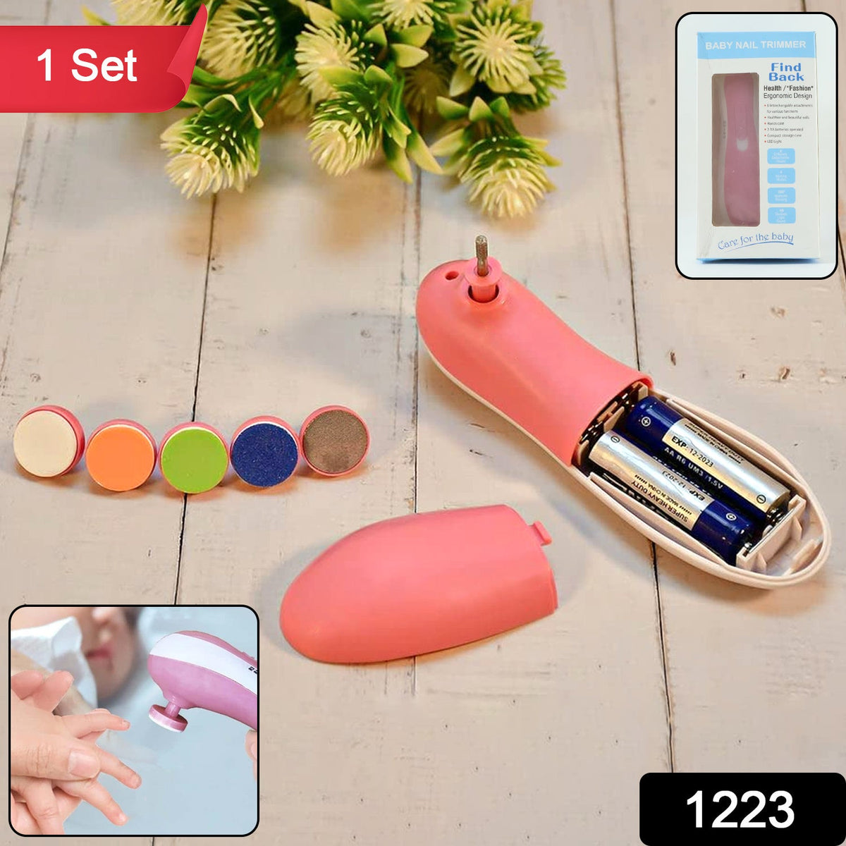 A pink electric nail trimmer with battery compartment open, five grinding heads, and product packaging.