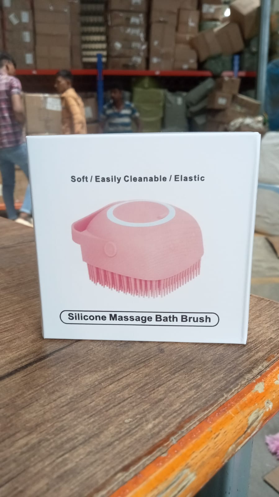 Silicone shampoo dispenser bath brush with soft bristles for a relaxing experience.