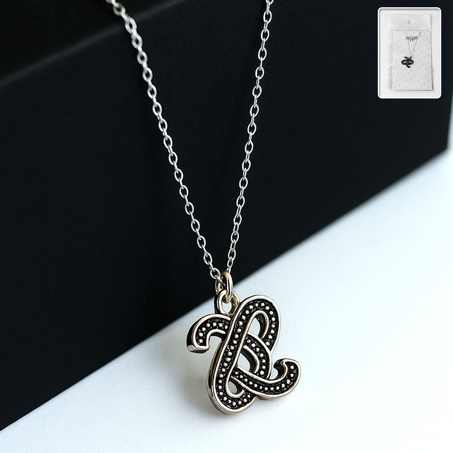 Pendant necklace featuring a stylish lightweight alloy chain with a unique enamel-coated pendant