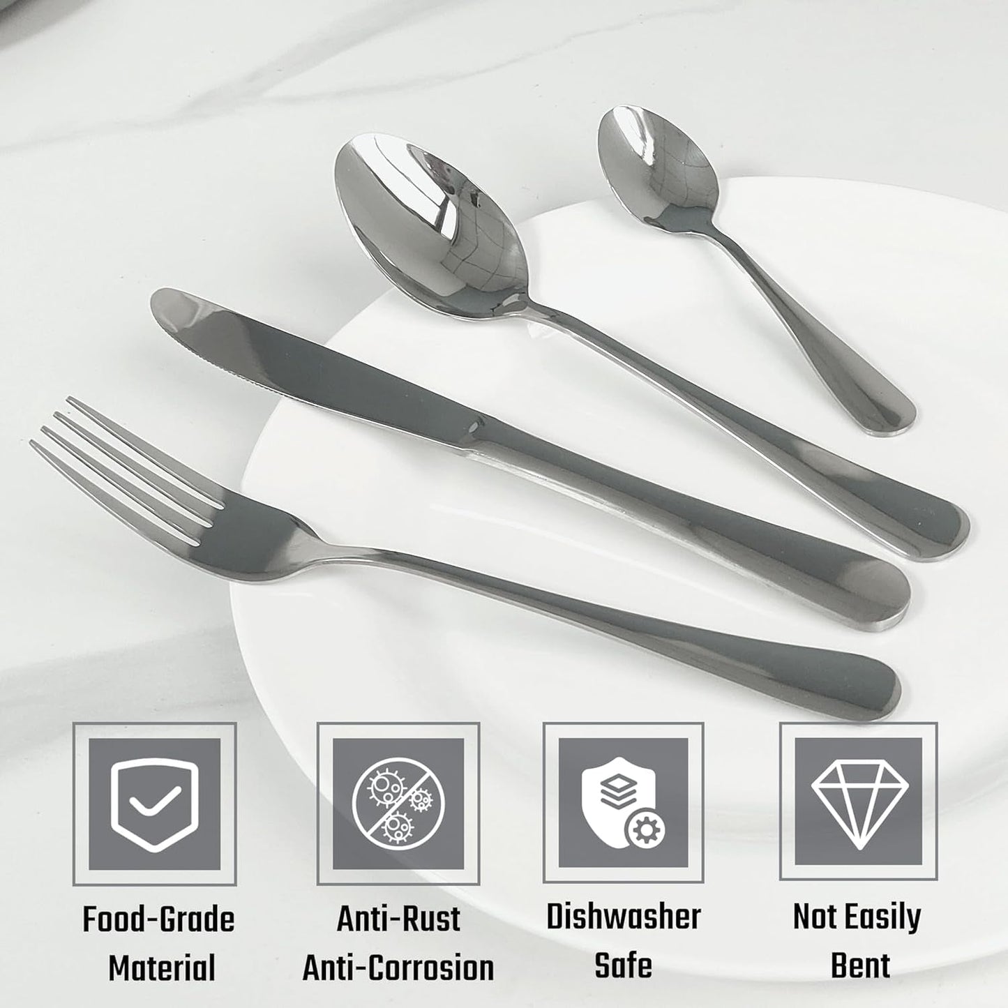 Elegant dining table arrangement with polished stainless steel cutlery