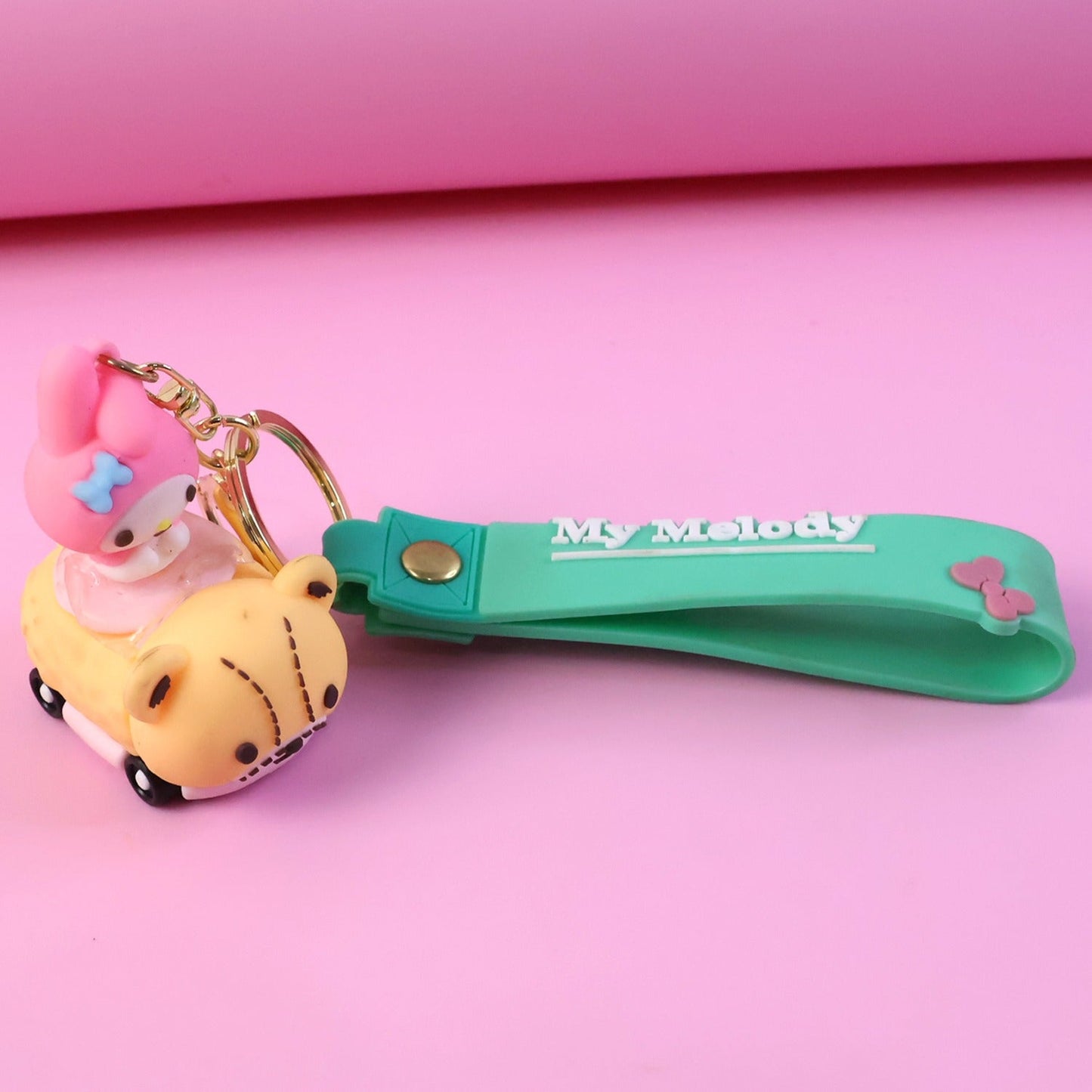 Cartoon character keychain with silicone strap and mini toy charm