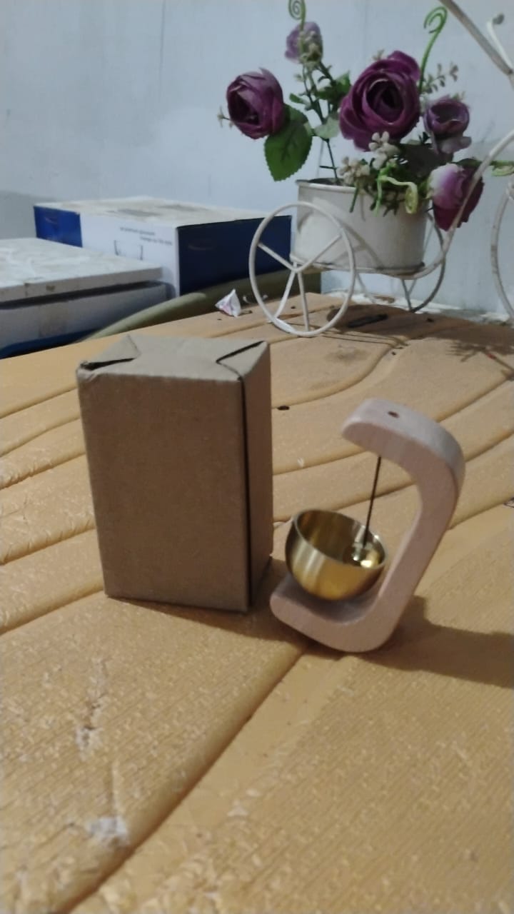 Side profile of Zen meditation bell placed on office desk