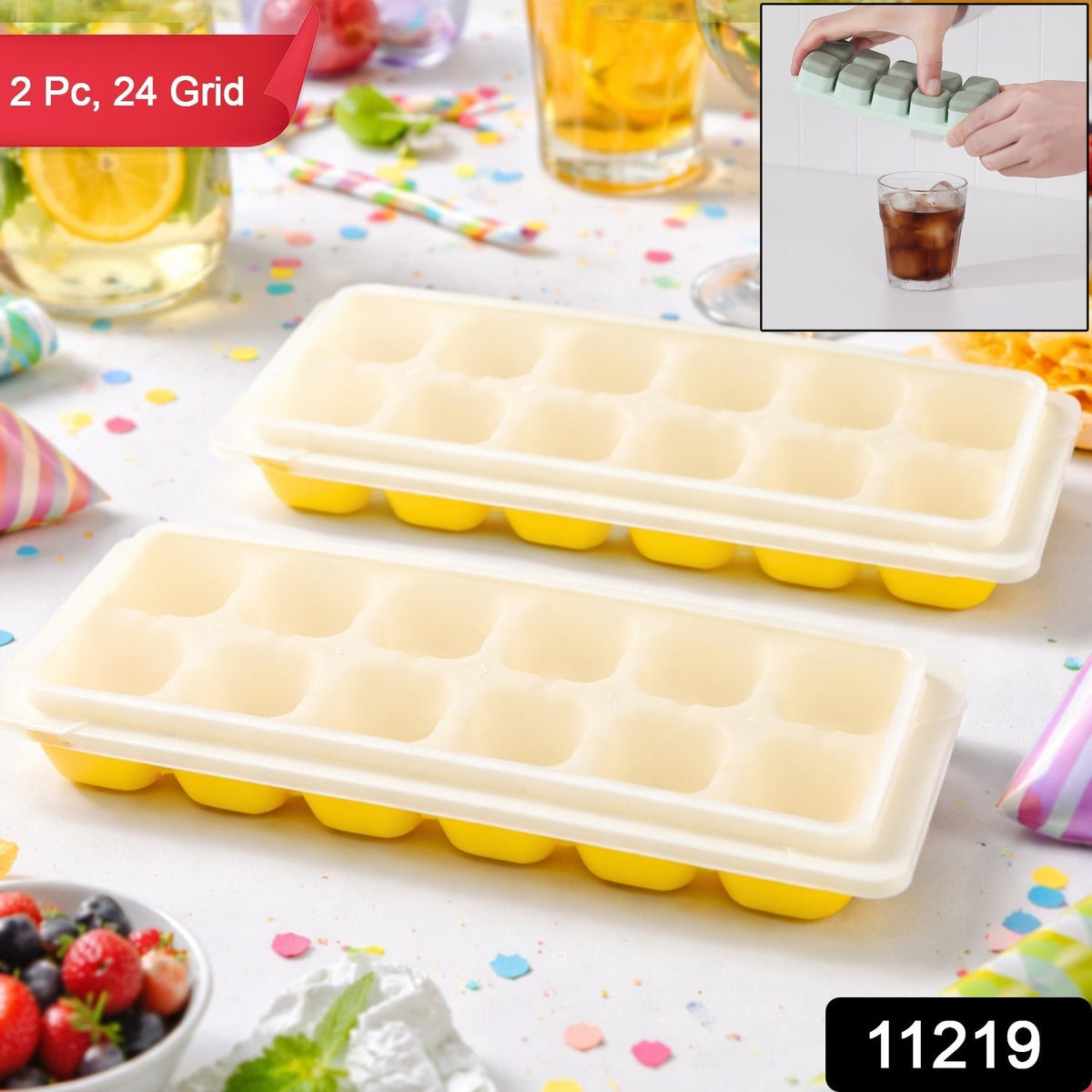 Two yellow silicone ice cube trays with clear lids on a confetti-strewn table. The inset shows hands pressing out ice cubes