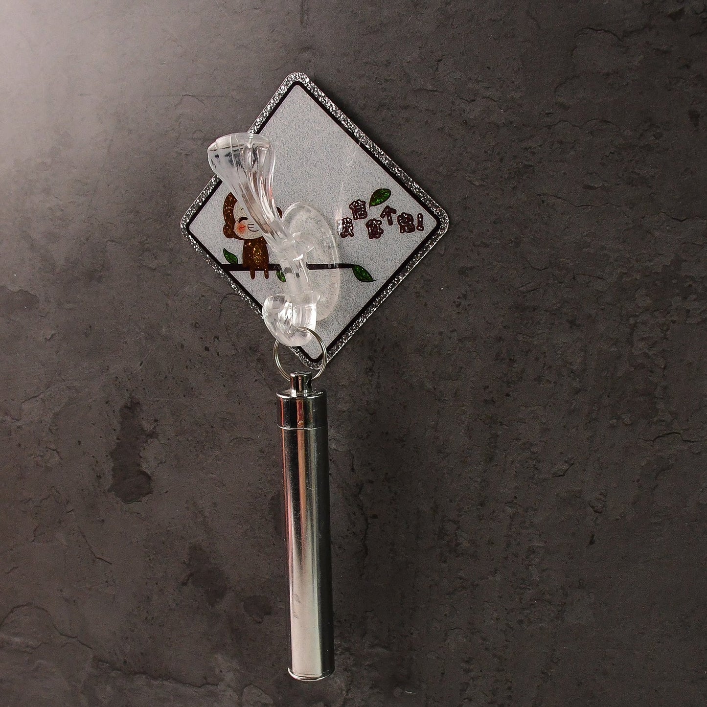 Sticky transparent wall hook showing strong self-adhesive backing