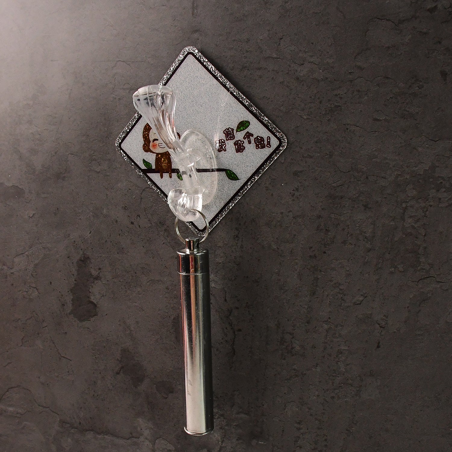 Sticky transparent wall hook showing strong self-adhesive backing