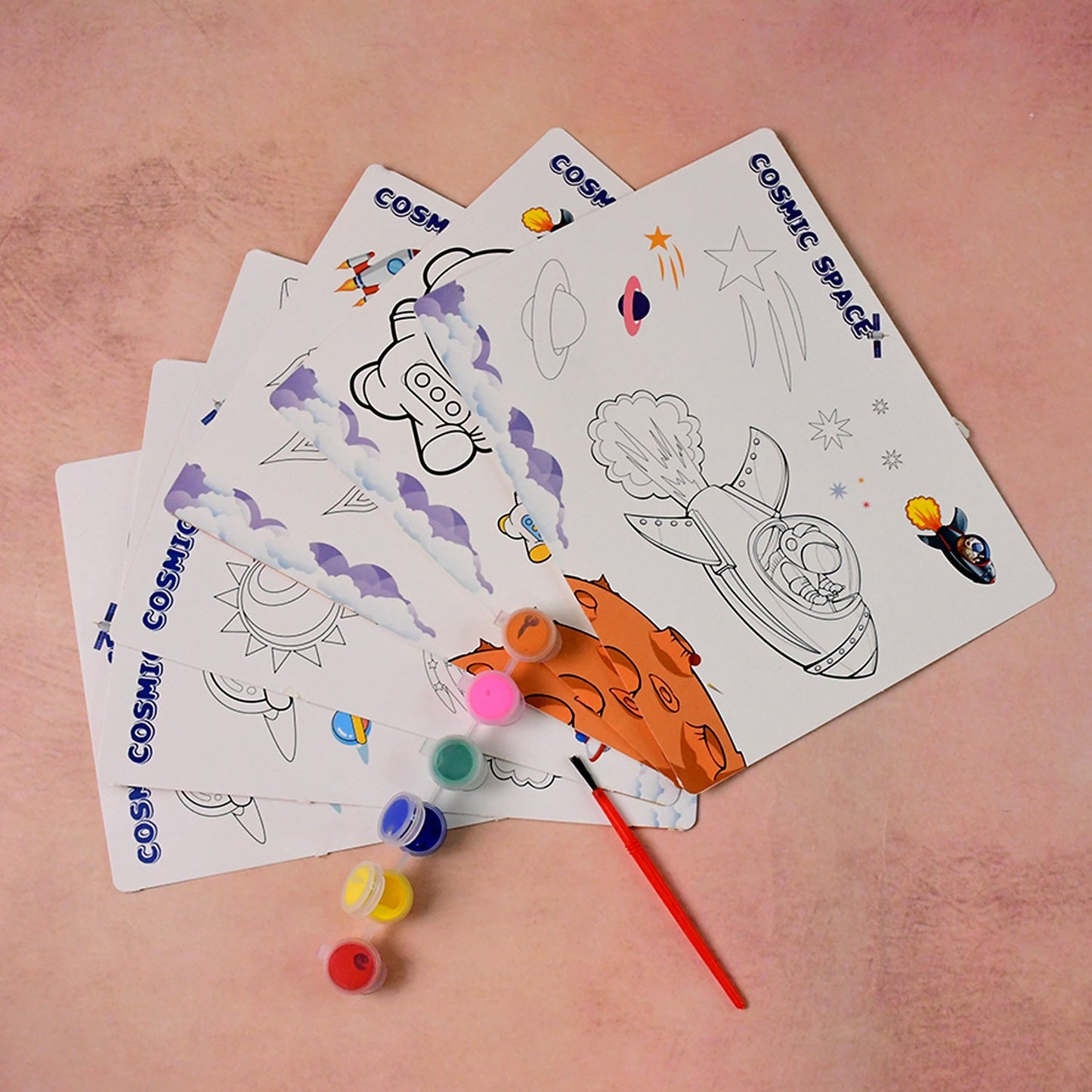 Children using cosmic space themed painting and coloring kit for creative learning